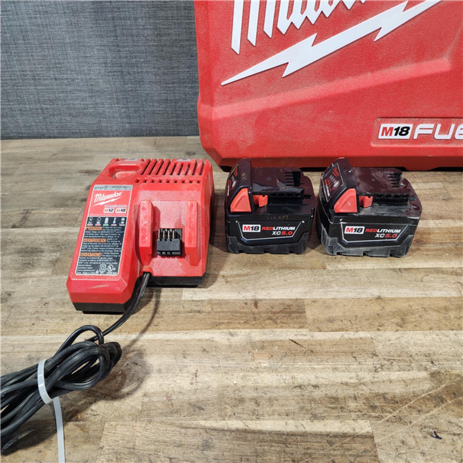 HOUSTON LOCATION - AS-IS Milwaukee FUEL 18V Lithium-Ion Brushless Cordless Hammer Drill and Impact Driver Combo Kit