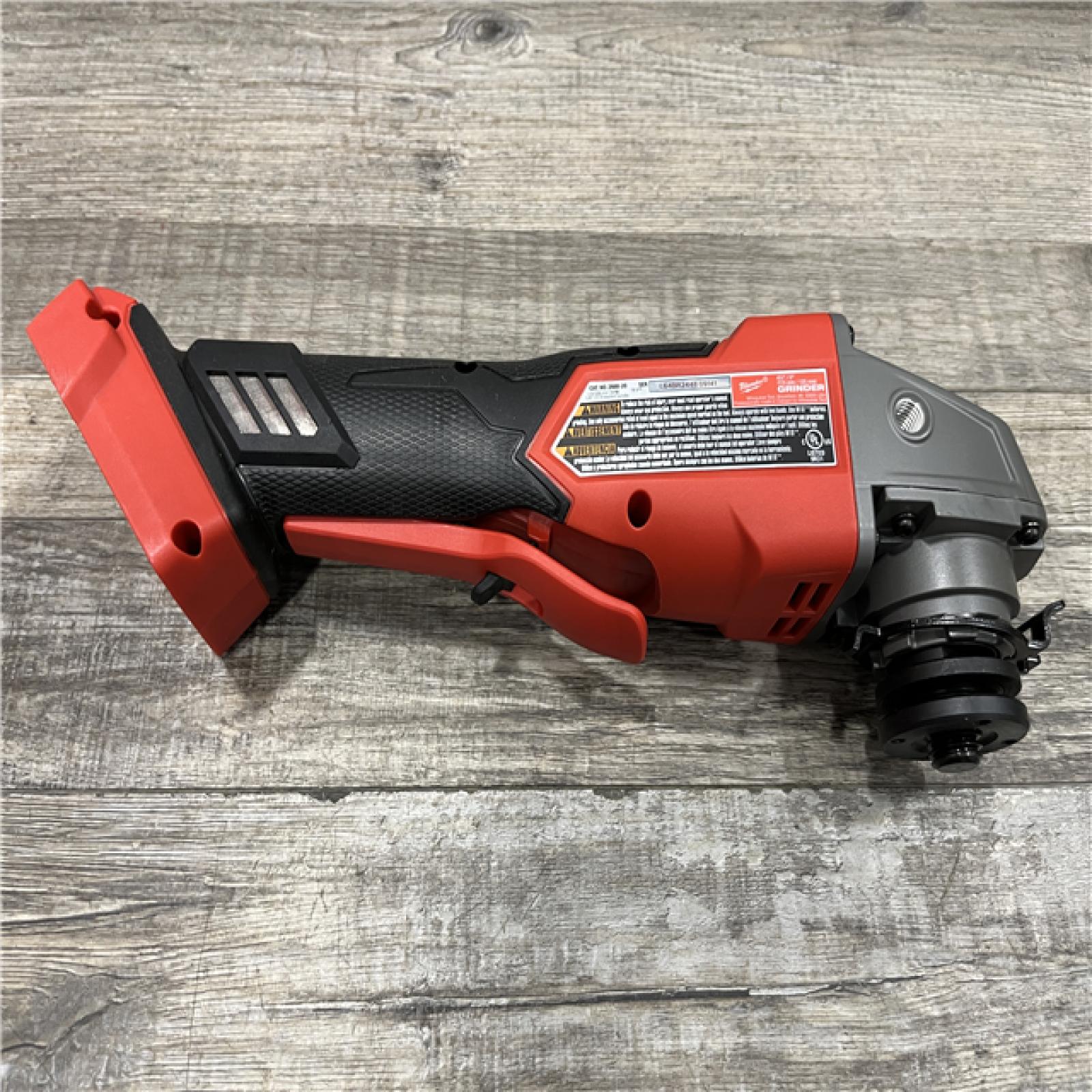 AS-IS Milwaukee FUEL 18V Lithium-Ion Brushless Cordless 4-1/2 in./5 in. Grinder w/Paddle Switch (Tool-Only)