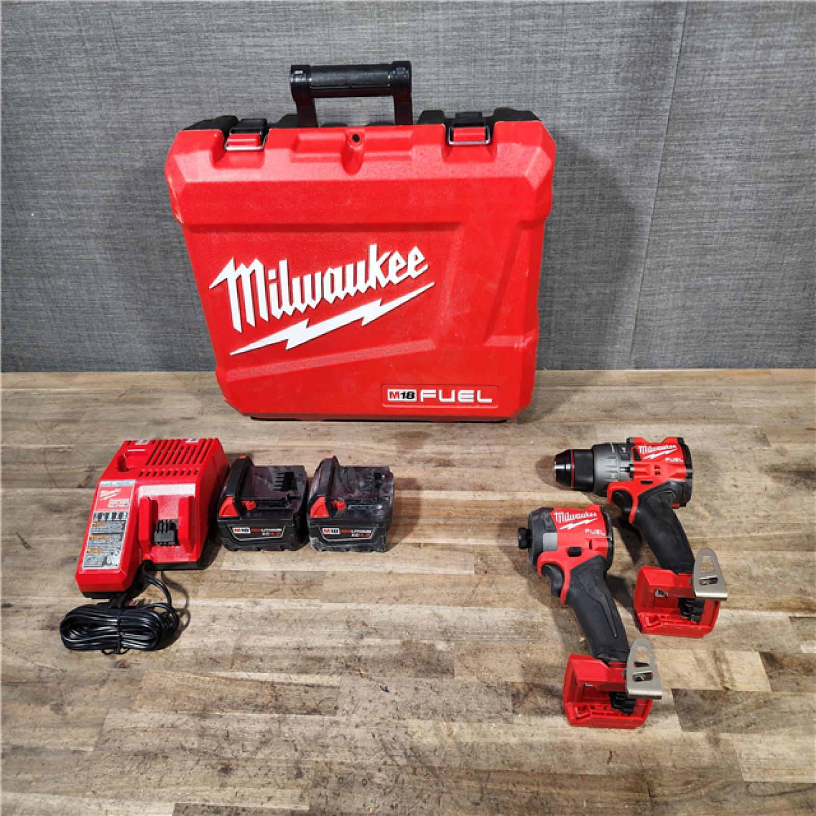 HOUSTON LOCATION - AS-IS MILWAUKEE FUEL 18V Lithium-Ion Brushless Cordless Hammer Drill and Impact Driver Combo Kit
