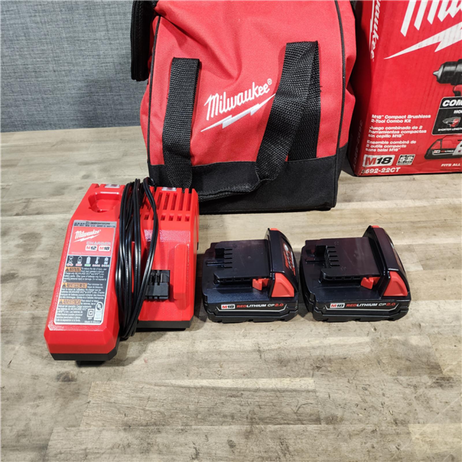 HOUSTON LOCATION - AS-IS Milwaukee M18 18V Lithium-Ion Brushless Cordless Compact Drill/Impact Combo Kit (2-Tool) W/(2) 2.0 Ah Batteries, Charger & Bag