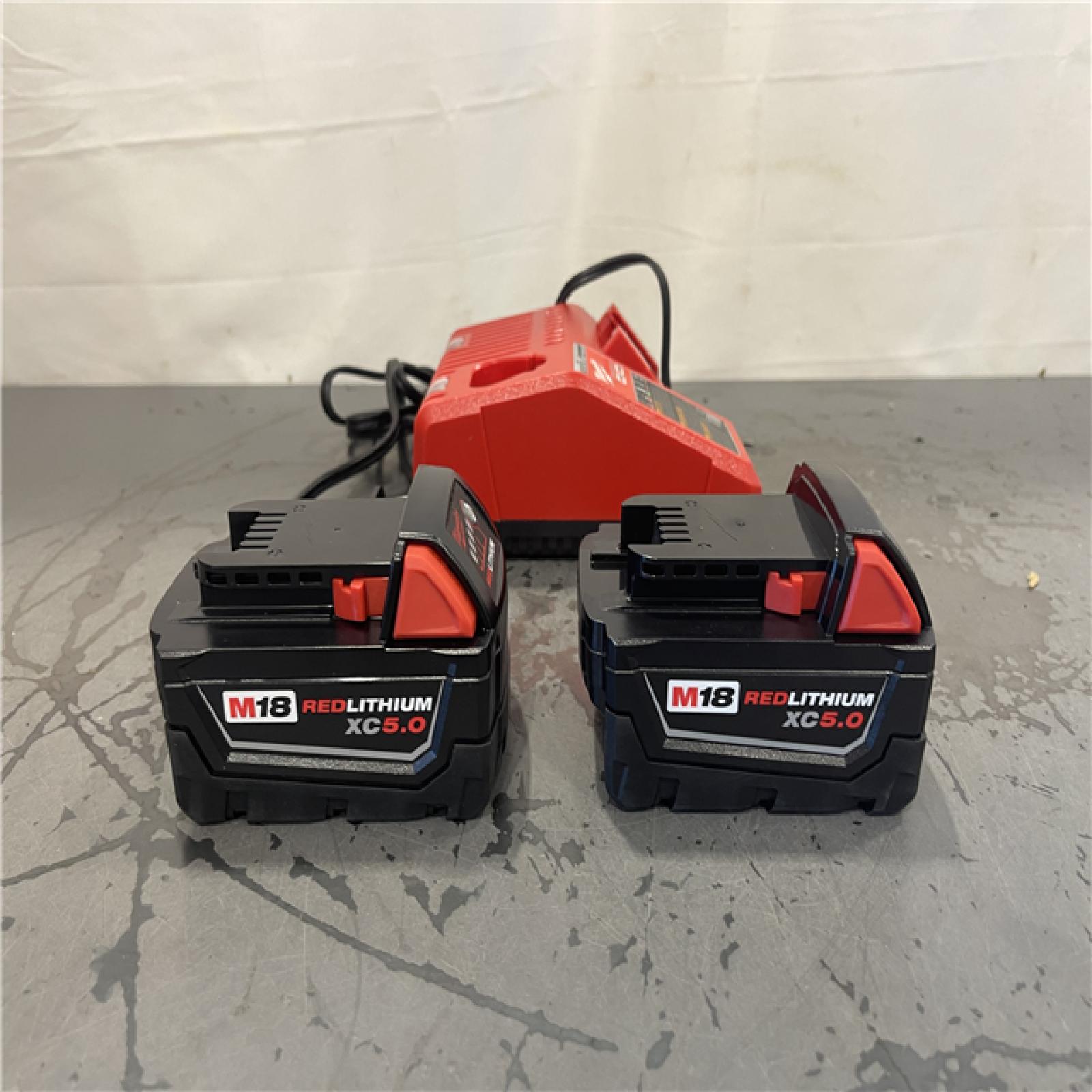 AS-IS- M18 18-Volt Lithium-Ion XC Starter Kit with Two 5.0Ah Batteries and Charger