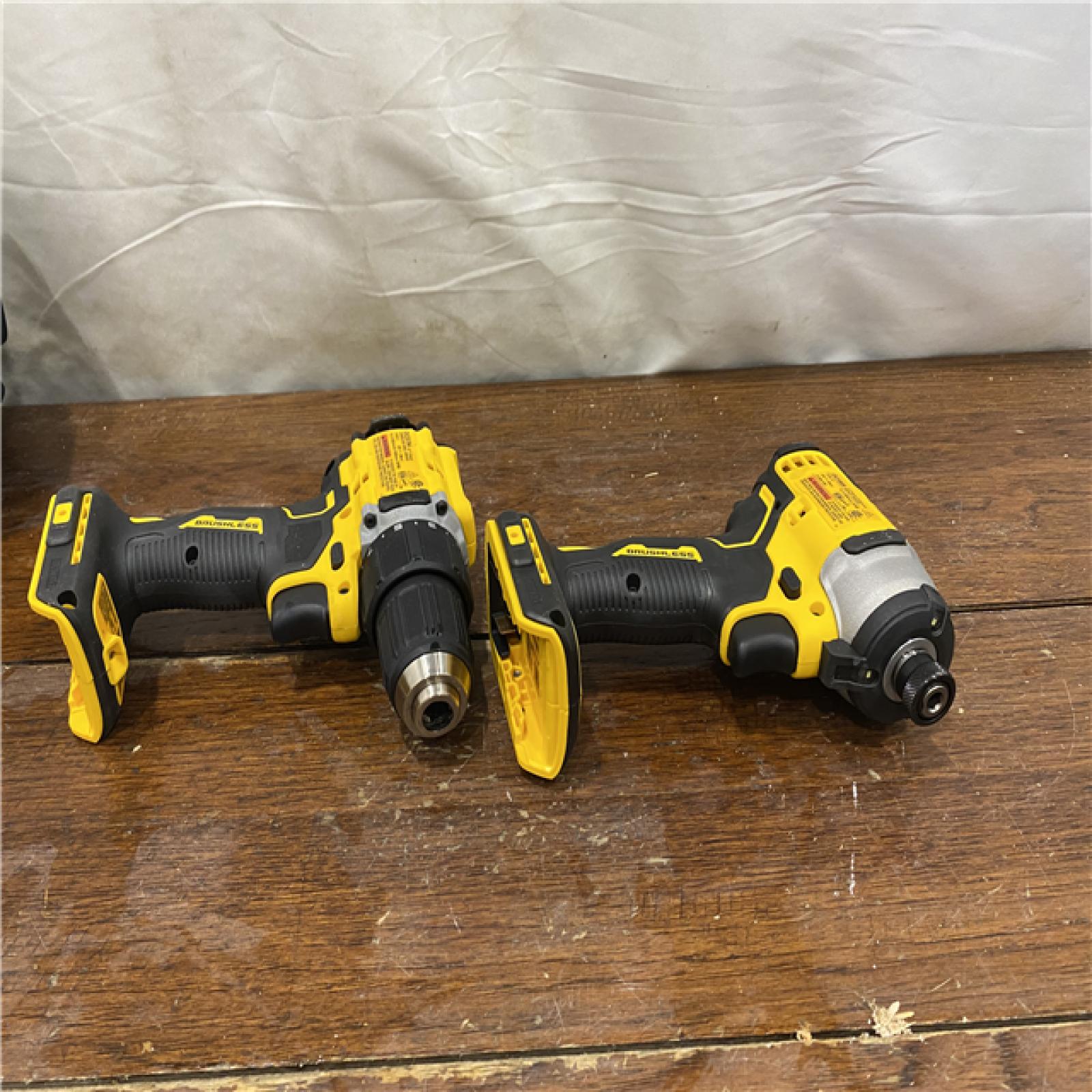 AS-IS Dewalt DCK225D2 20V MAX ATOMIC Brushless Compact Lithium-Ion 1/2 in. Cordless Drill Driver and 1/4 in. Impact Driver Combo Kit with 2 Batteries 2 Ah