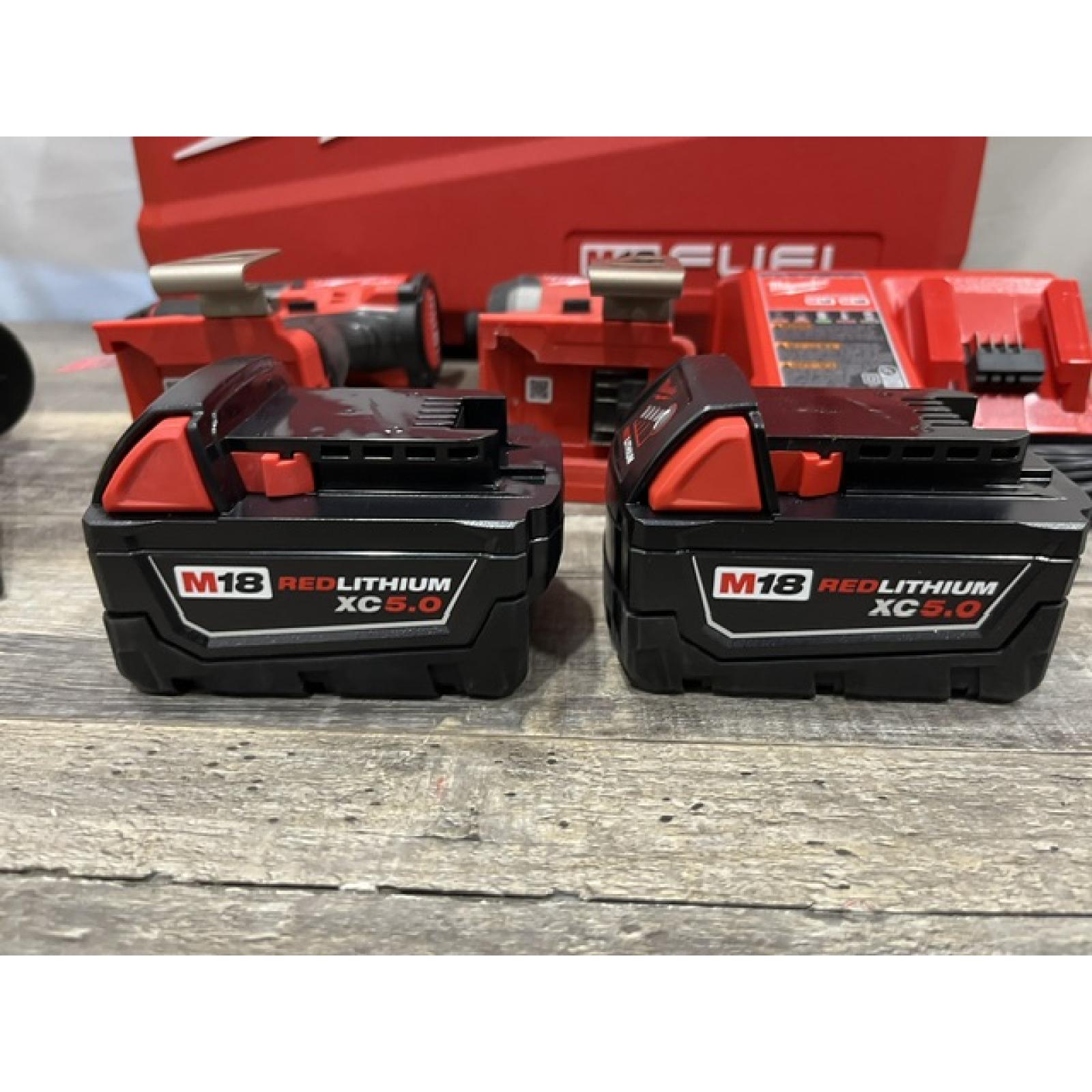 AS-IS Milwaukee FUEL 18V Lithium-Ion Brushless Cordless Hammer Drill and Impact Driver Combo Kit
