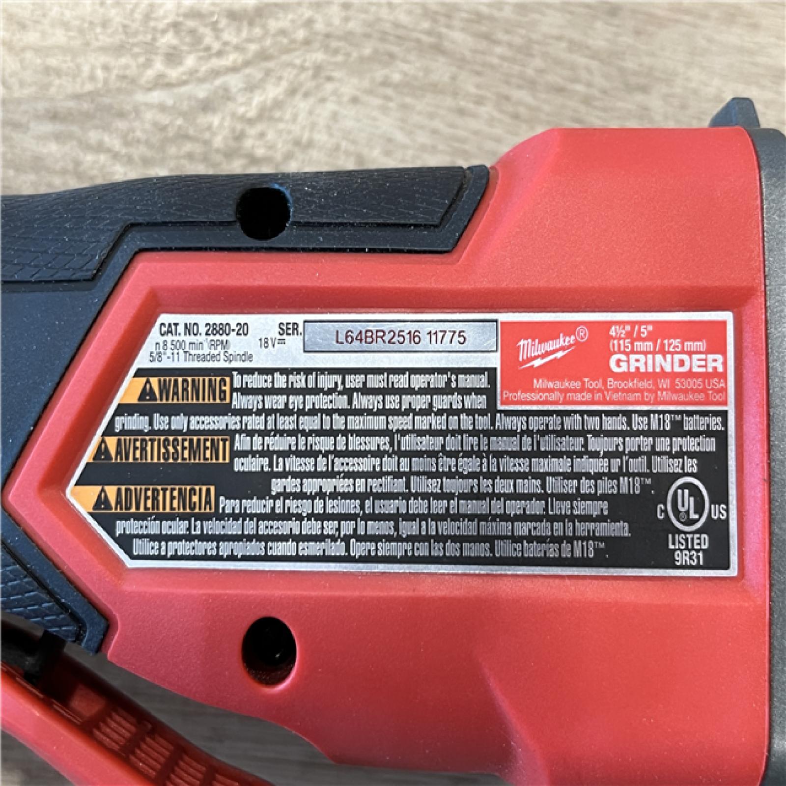 AS-IS Milwaukee FUEL 18V Lithium-Ion Brushless Cordless 4-1/2 in./5 in. Grinder w/Paddle Switch (Tool-Only)