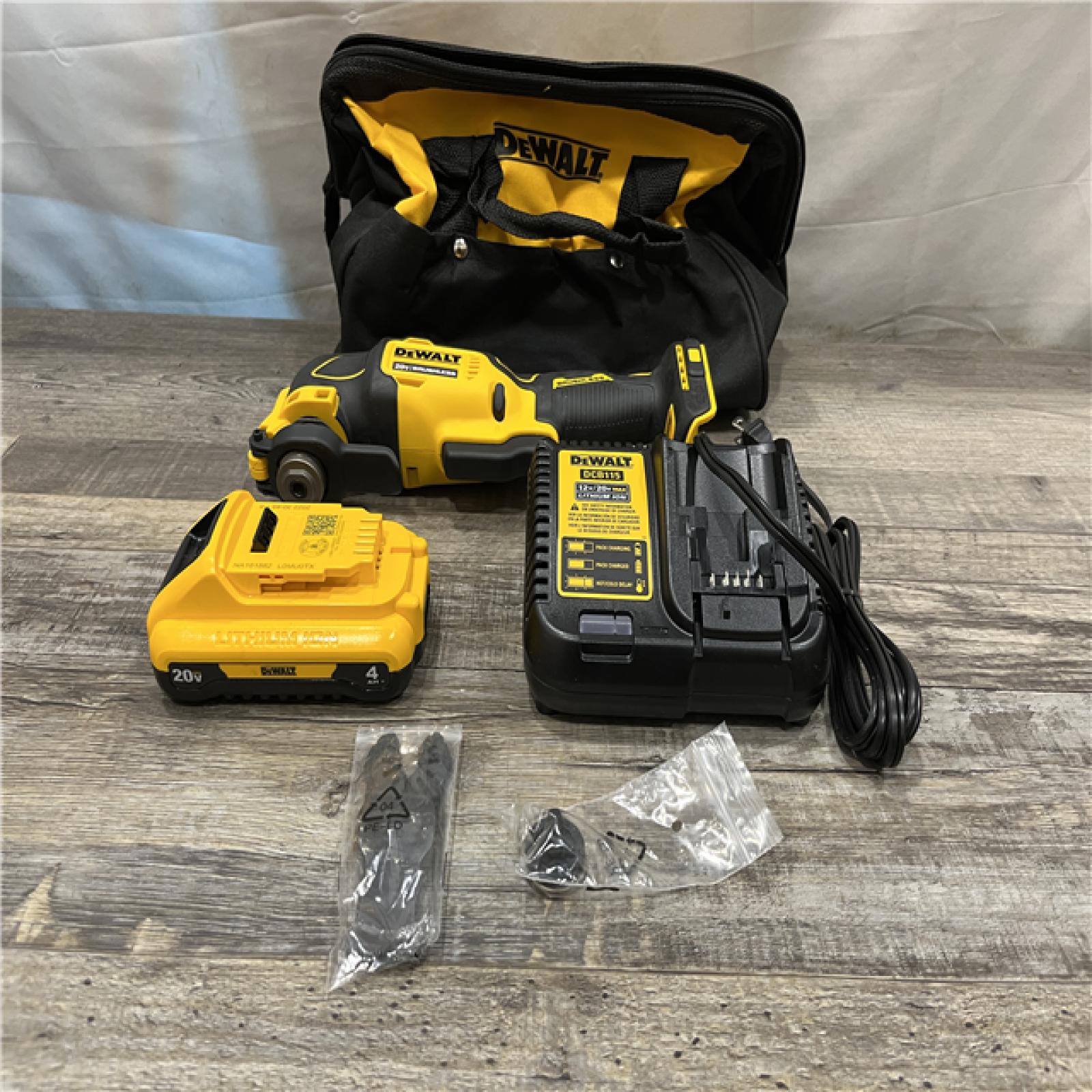 AS-IS DEWALT ATOMIC 20V MAX Lithium-Ion Cordless Oscillating Tool Kit with 4.0Ah Battery  Charger and Kit Bag