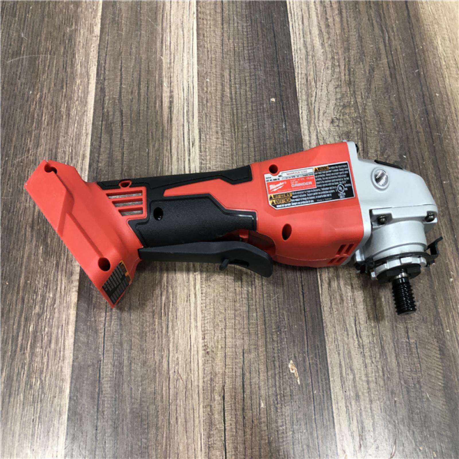 AS-IS Milwaukee 18V Lithium-Ion Brushless Cordless 4-1/2 in./5 in. Grinder w/Paddle Switch (Tool-Only)