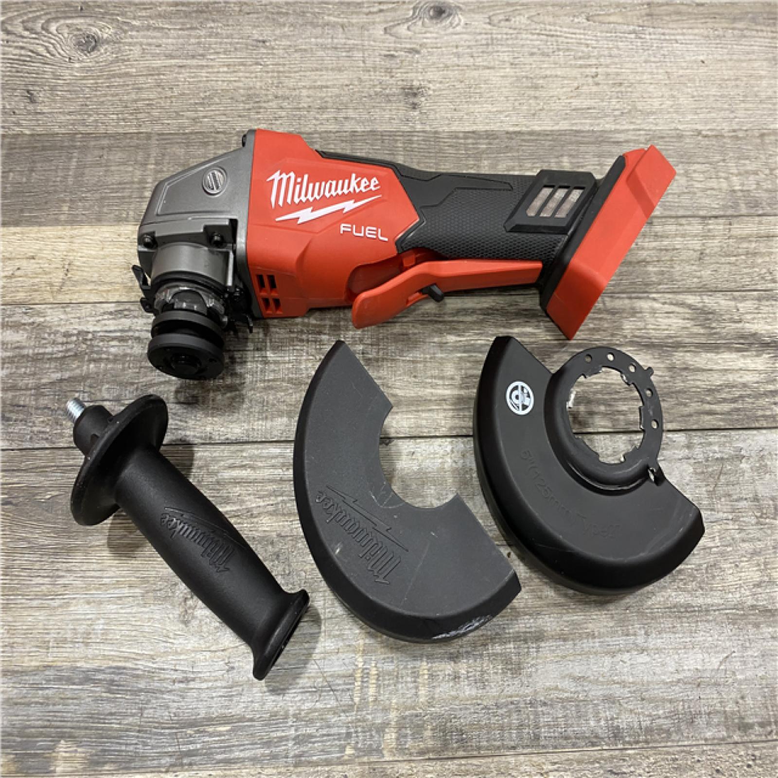 AS-IS Milwaukee FUEL 18V Lithium-Ion Brushless Cordless 4-1/2 in./5 in. Grinder w/Paddle Switch (Tool-Only)