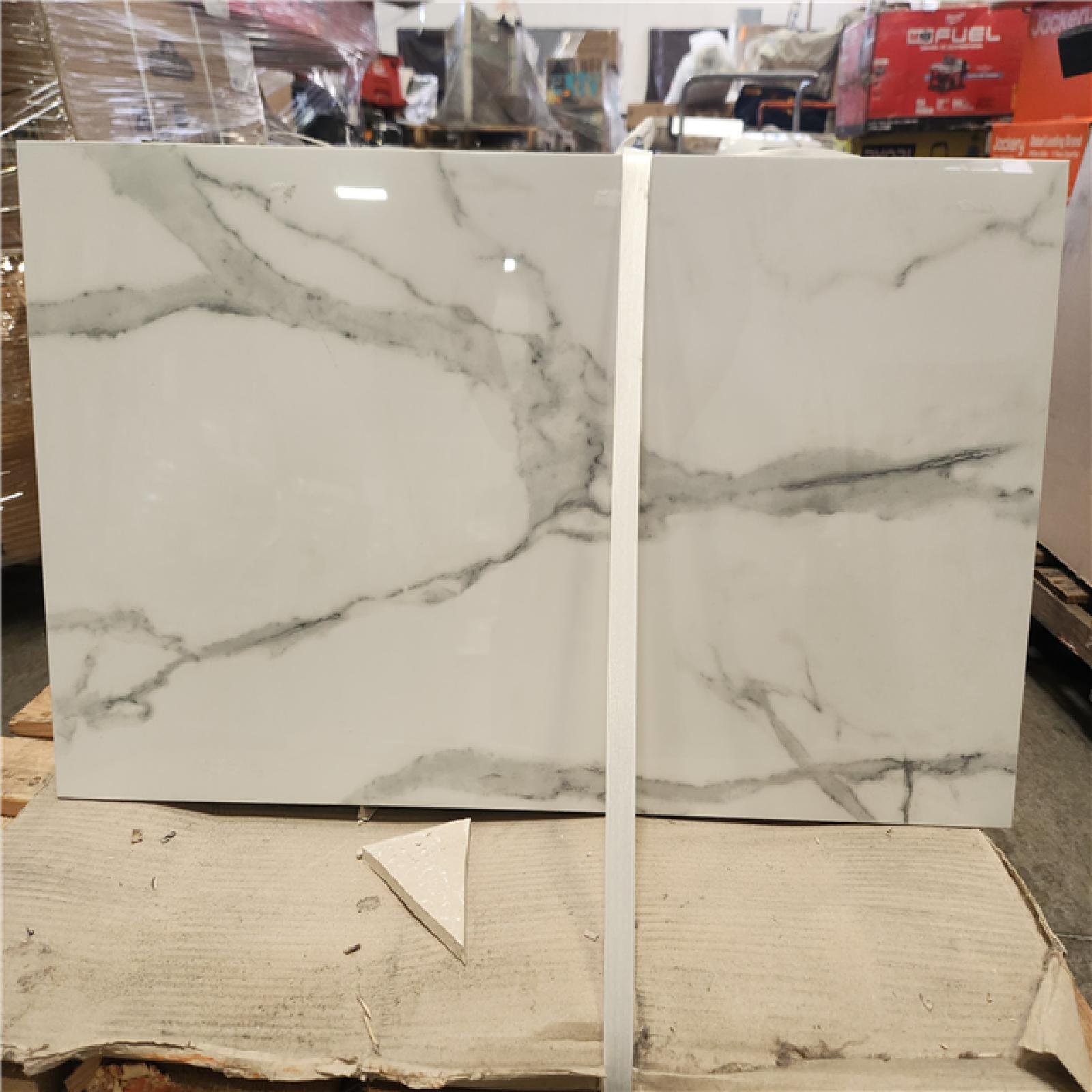 Phoenix Location MSI Carrara Noire 16 in. x 32 in. Polished Porcelain Marble Look Floor and Wall Tile (203 sq. ft. 15 Case)