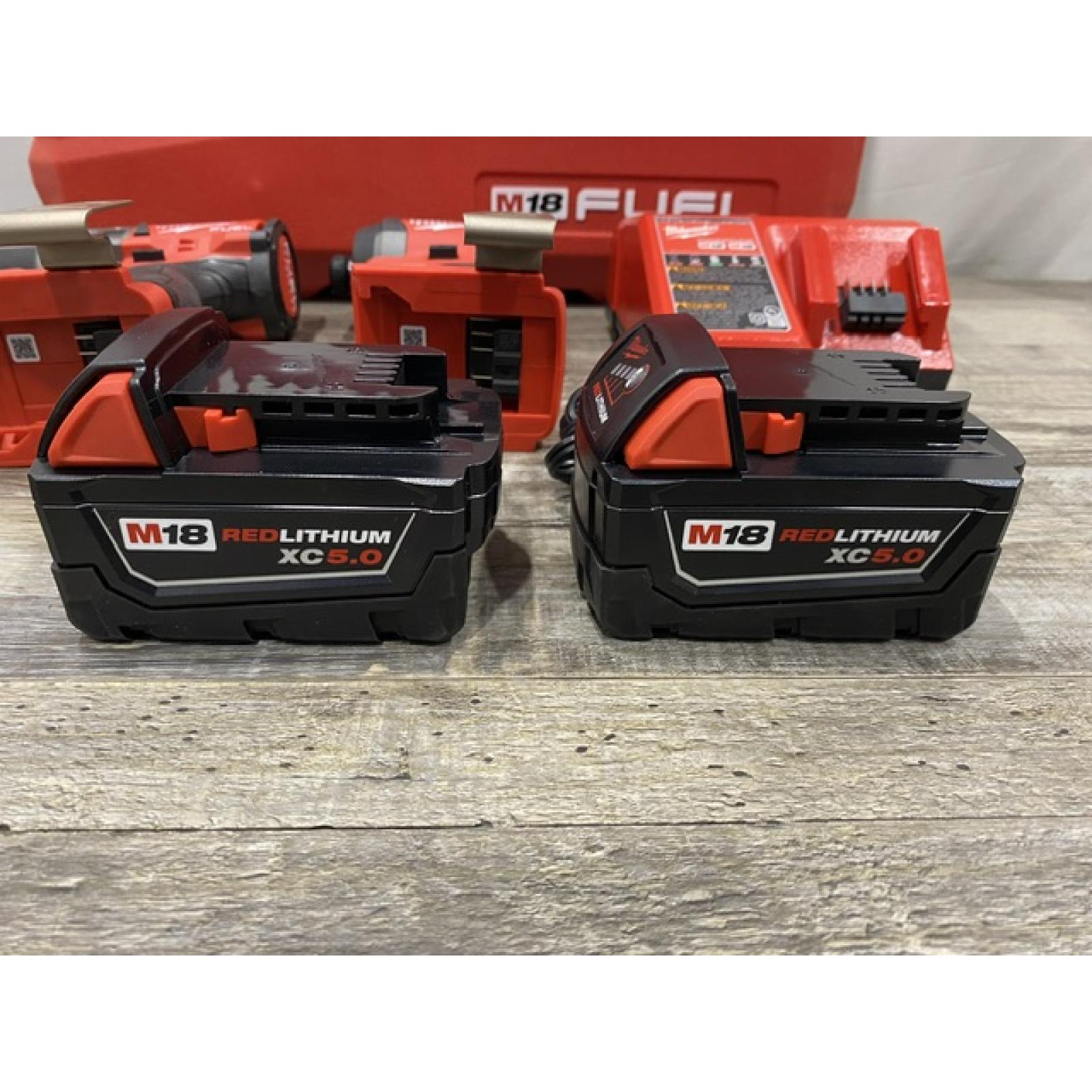 AS-IS Milwaukee FUEL 18V Lithium-Ion Brushless Cordless Hammer Drill and Impact Driver Combo Kit