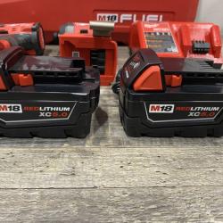 AS-IS Milwaukee FUEL 18V Lithium-Ion Brushless Cordless Hammer Drill and Impact Driver Combo Kit