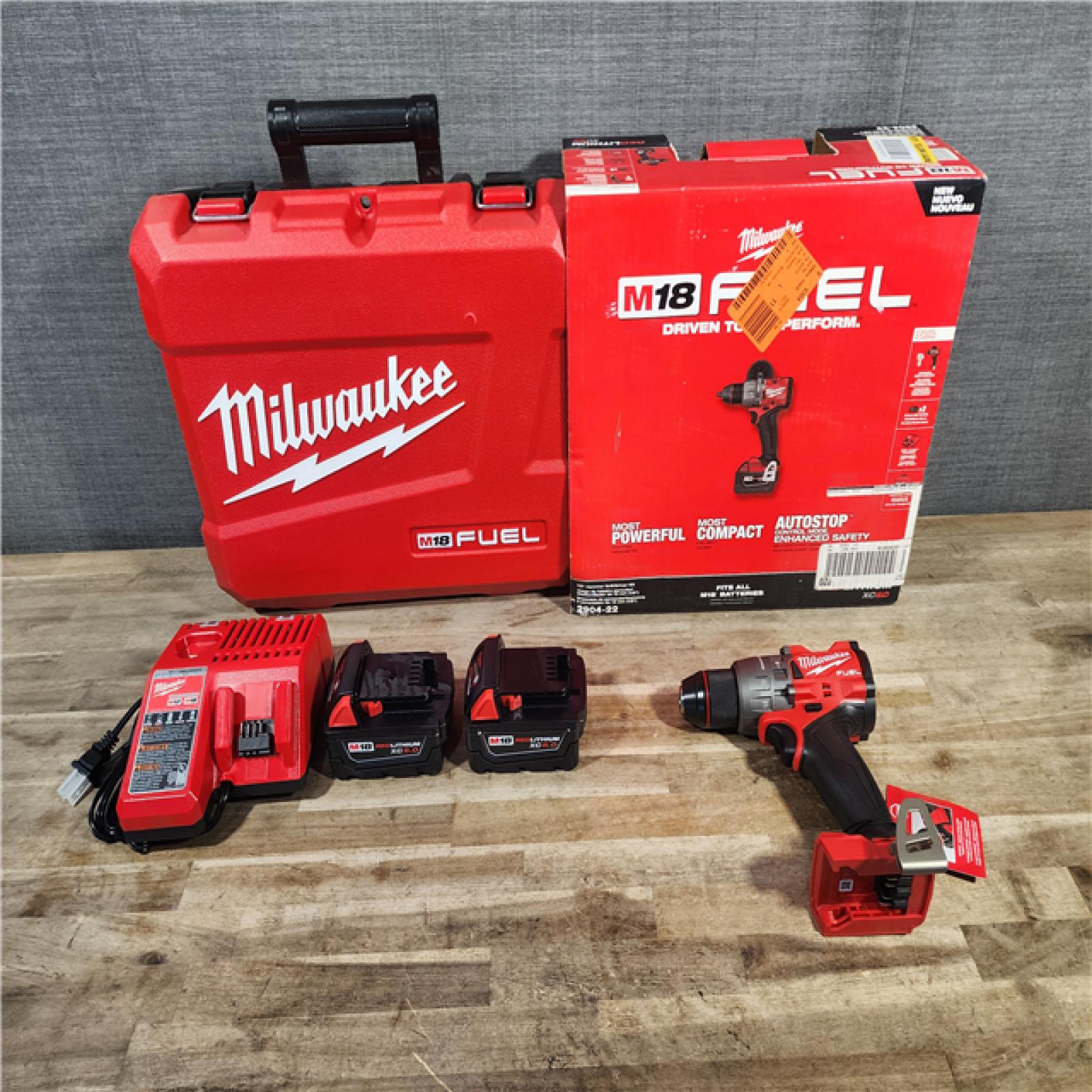HOUSTON LOCATION - AS-IS (APPEARS LIKE NEW) Milwaukee 2904-22 Hammer Drill Driver Kit with Batteries  Charger & Tool Case  Red