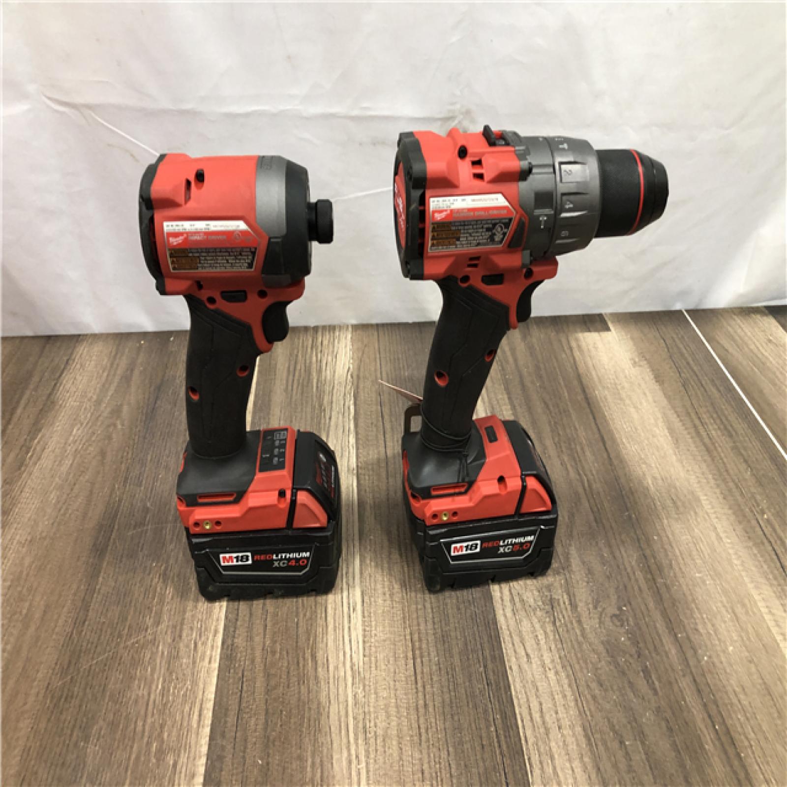 AS-IS Milwaukee  FUEL 18V Lithium-Ion Brushless Cordless Hammer Drill and Impact Driver Combo Kit