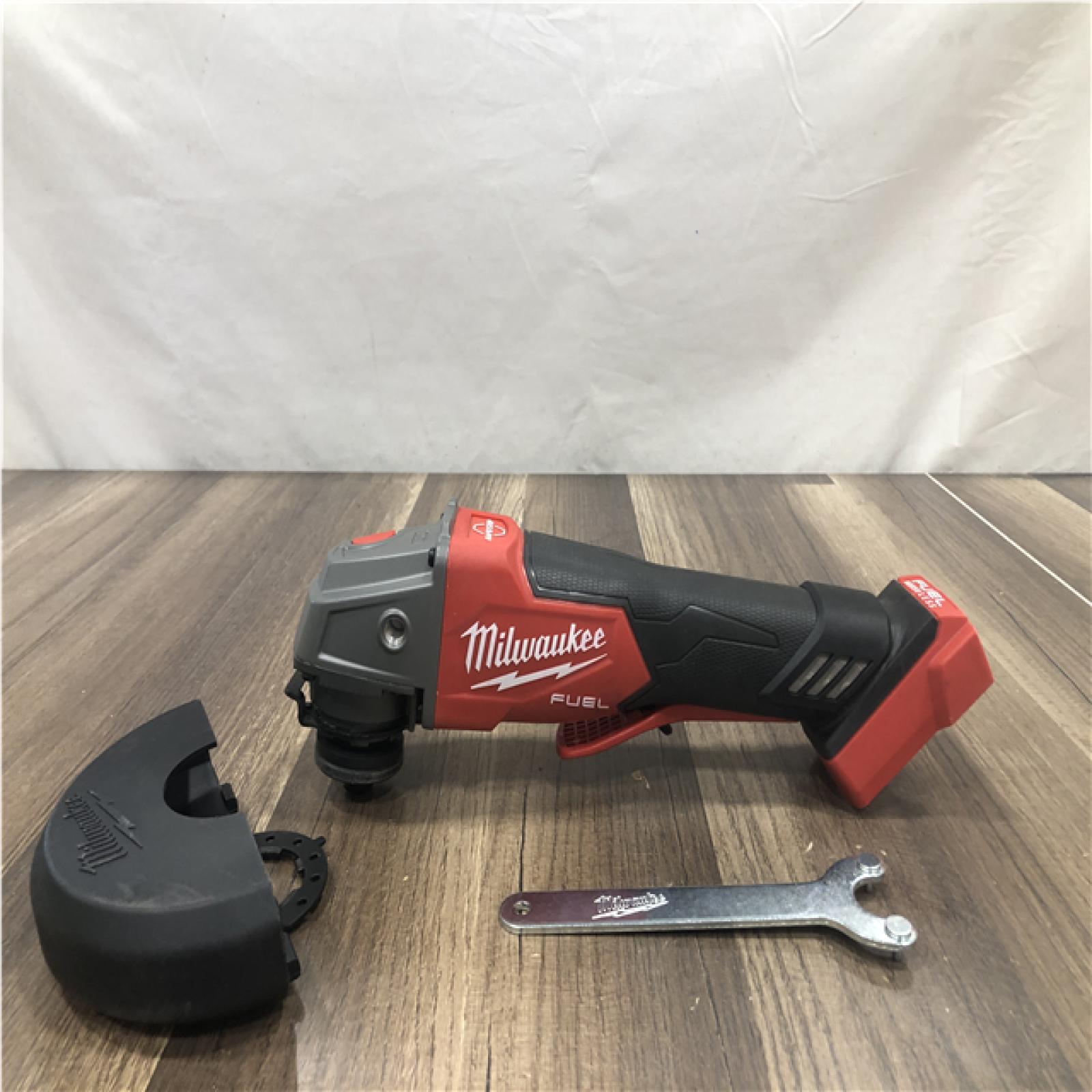 AS-IS Milwaukee FUEL 18V Lithium-Ion Brushless Cordless 4-1/2 in./5 in. Grinder w/Paddle Switch (Tool-Only)