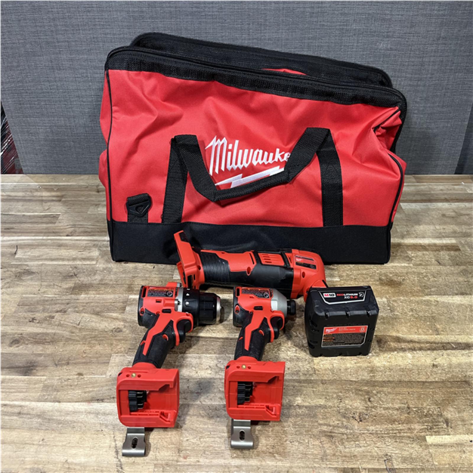 Houston Location AS-IS Milwaukee Drill Driver and Impact Driver and Multi Tool and Battery