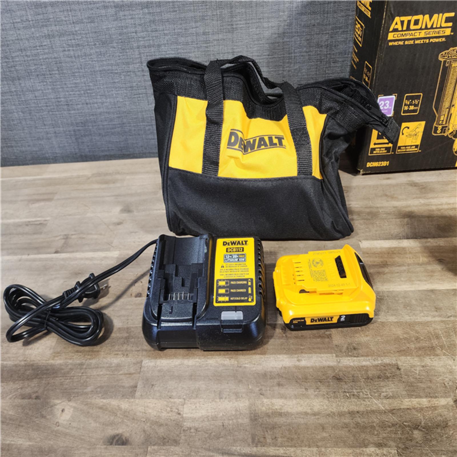 HOUSTON LOCATION - AS-IS (APPEARS LIKE NEW) DEWALT ATOMIC 20V MAX Lithium Ion Cordless 23 Gauge Pin Nailer Kit with 2.0Ah Battery and Charger