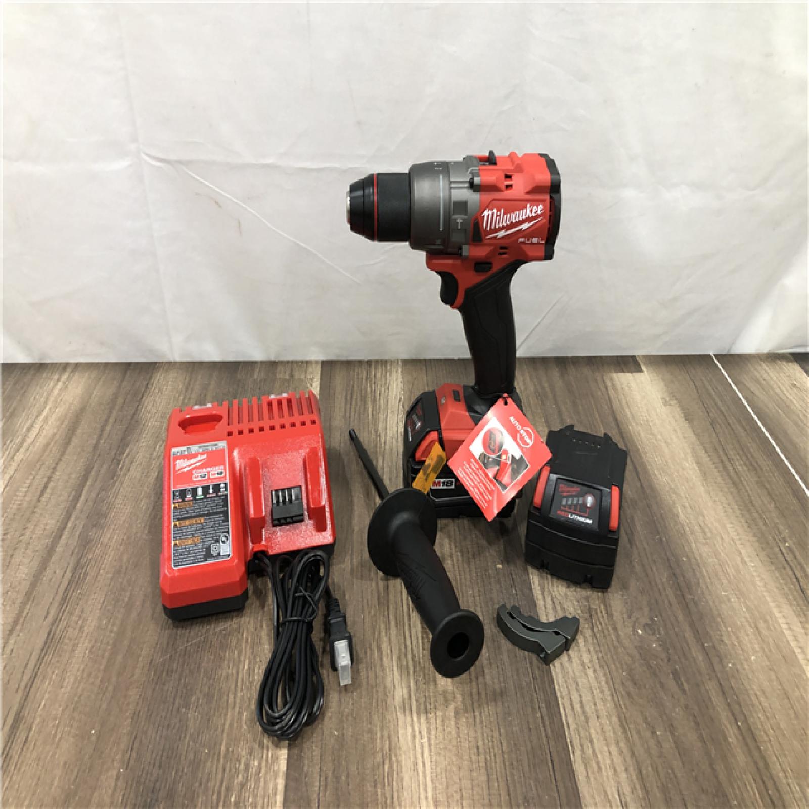 AS-IS Milwaukee FUEL 18V Lithium-Ion Brushless Cordless 1/2 in. Hammer Drill Driver Kit