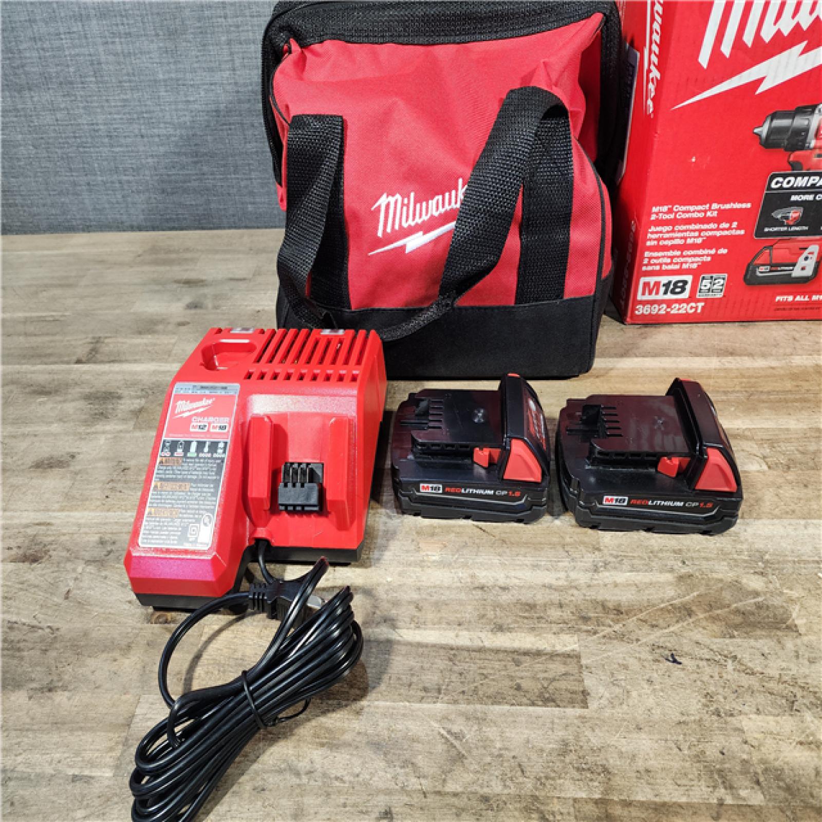 HOUSTON LOCATION - AS-IS Milwaukee M18 18V Lithium-Ion Brushless Cordless Compact Drill/Impact Combo Kit (2-Tool) W/(2) 2.0 Ah Batteries  Charger & Bag