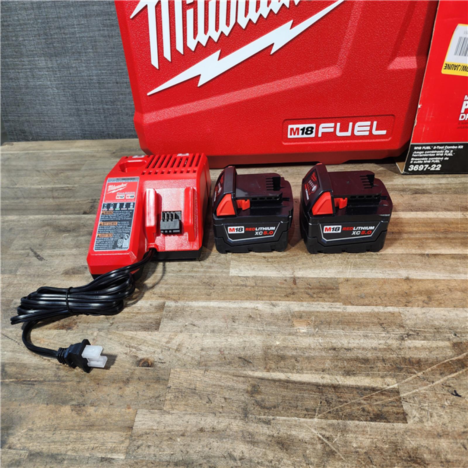 HOUSTON LOCATION - AS-IS Milwaukee FUEL 18V Lithium-Ion Brushless Cordless Hammer Drill and Impact Driver Combo Kit