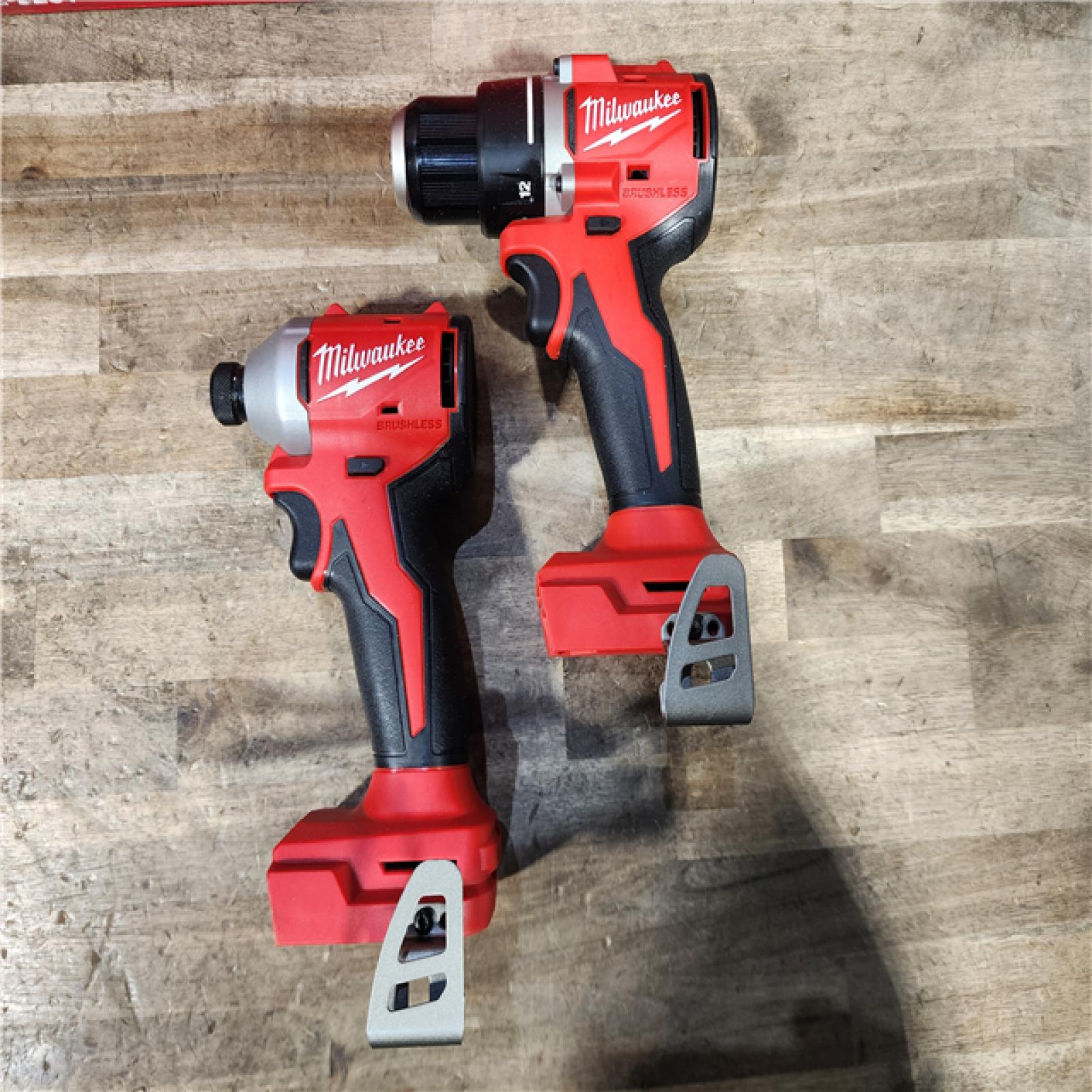 HOUSTON LOCATION - AS-IS Milwaukee M18 18V Lithium-Ion Brushless Cordless Compact Drill/Impact Combo Kit (2-Tool) W/(2) 2.0 Ah Batteries  Charger & Bag