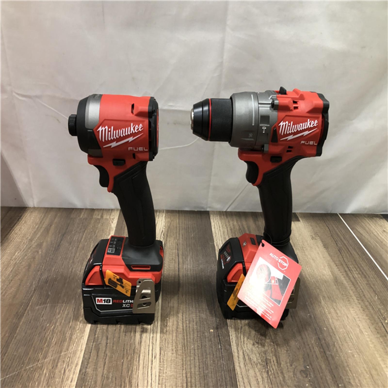 AS-IS Milwaukee FUEL 18V Lithium-Ion Brushless Cordless Hammer Drill and Impact Driver Combo Kit