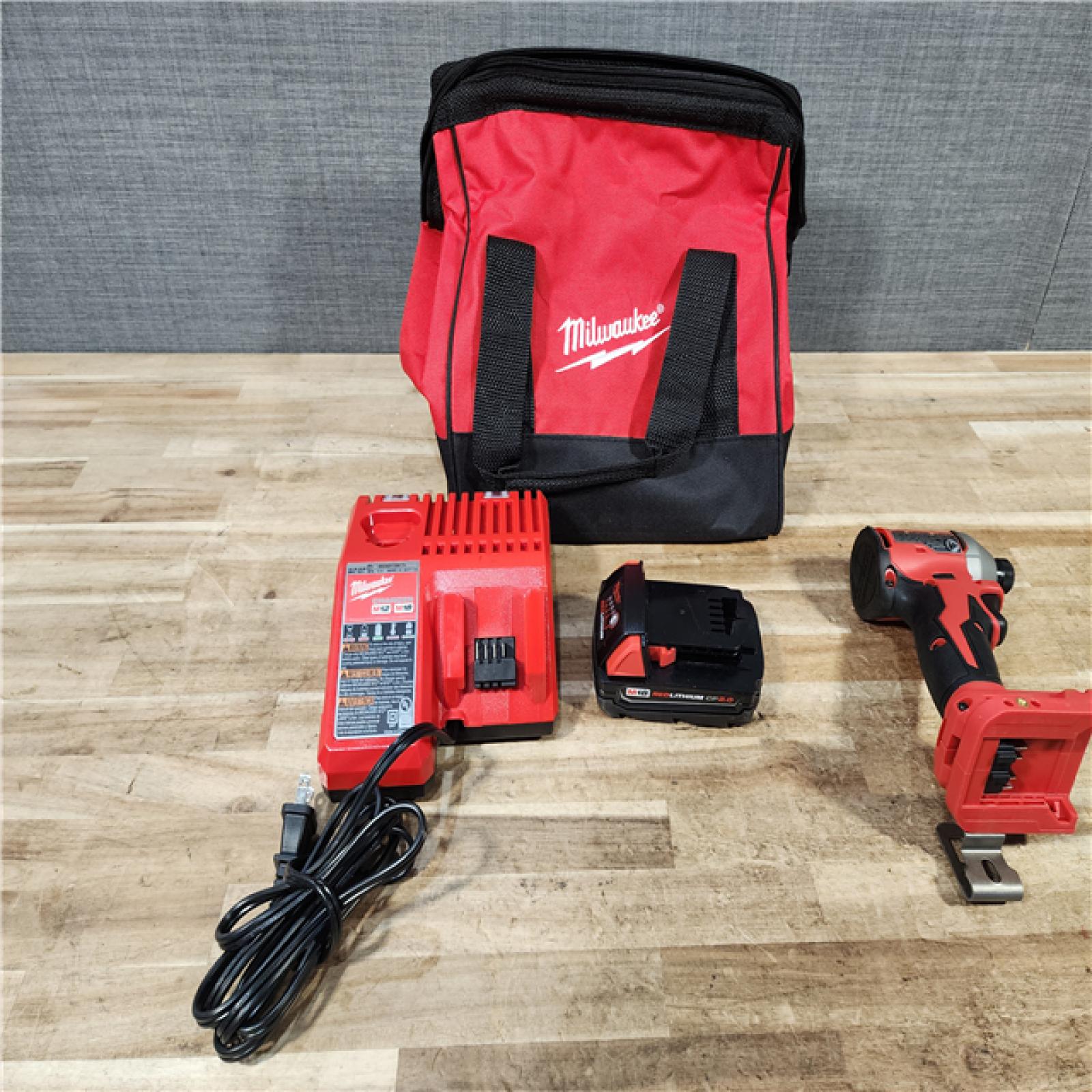 HOUSTON LOCATION - AS - IS Milwaukee 18-Volt Lithium-Ion Compact Brushless Cordless 1/4 in. Impact Driver Kit
