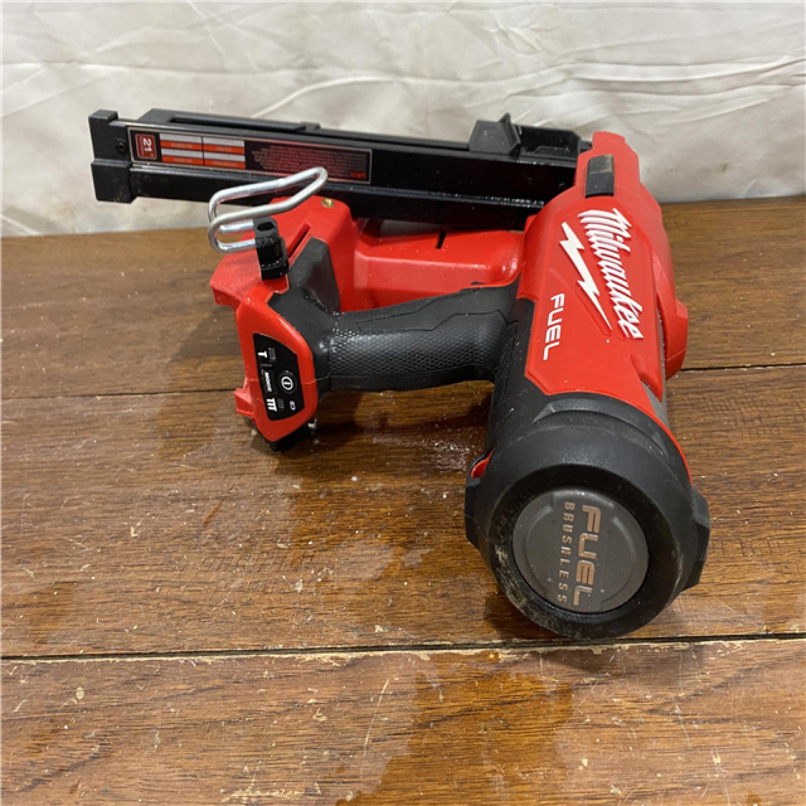 AS-IS Milwaukee 2744-20 M18 FUEL 3-1/2 in. 18-Volt 21-Degree Lithium-Ion Brushless Cordless Framing Nailer (Tool-Only)