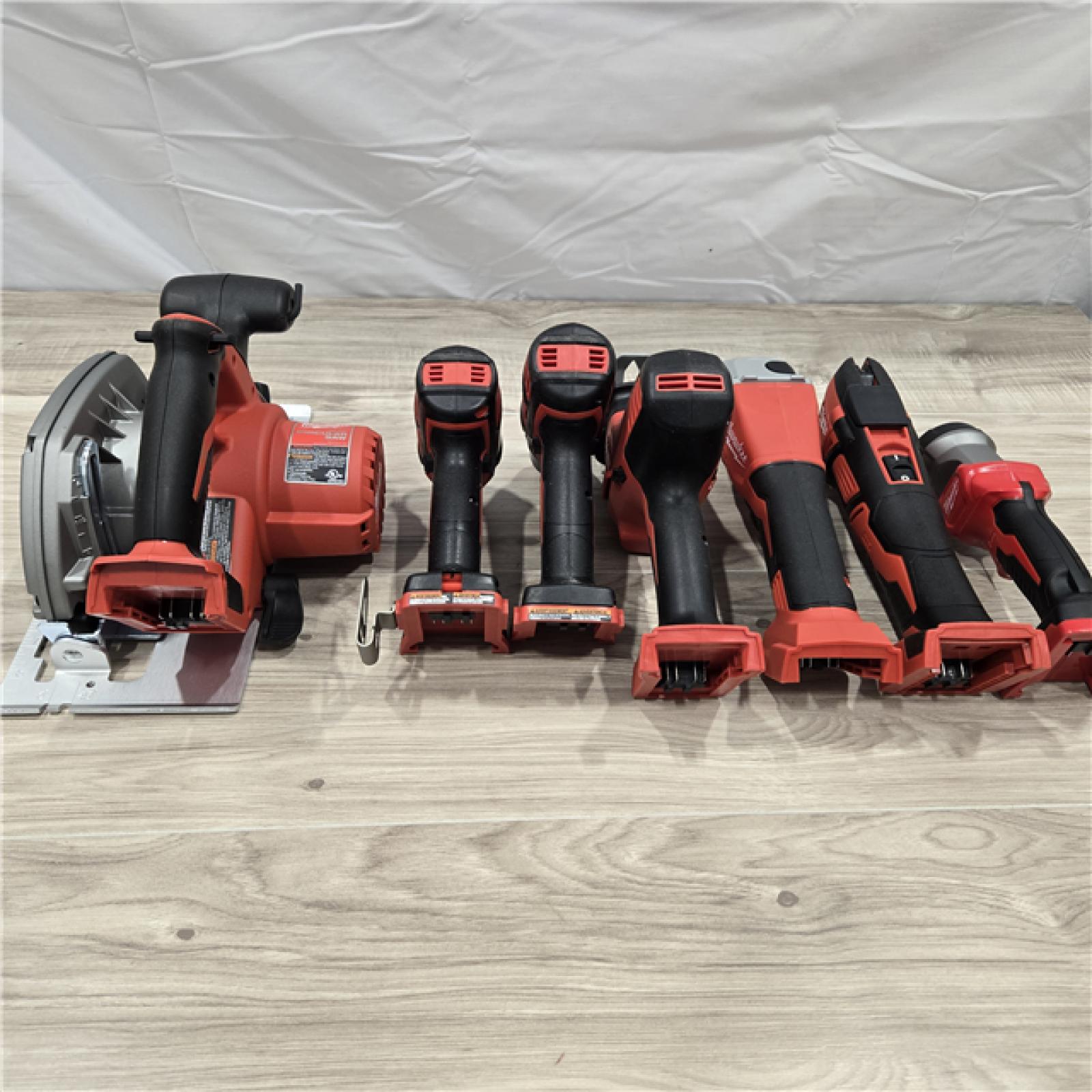 AS-IS Milwaukee M18 18-Volt Lithium-Ion Cordless Combo Kit 7-Tool with 2-Batteries, Charger and Tool Bag