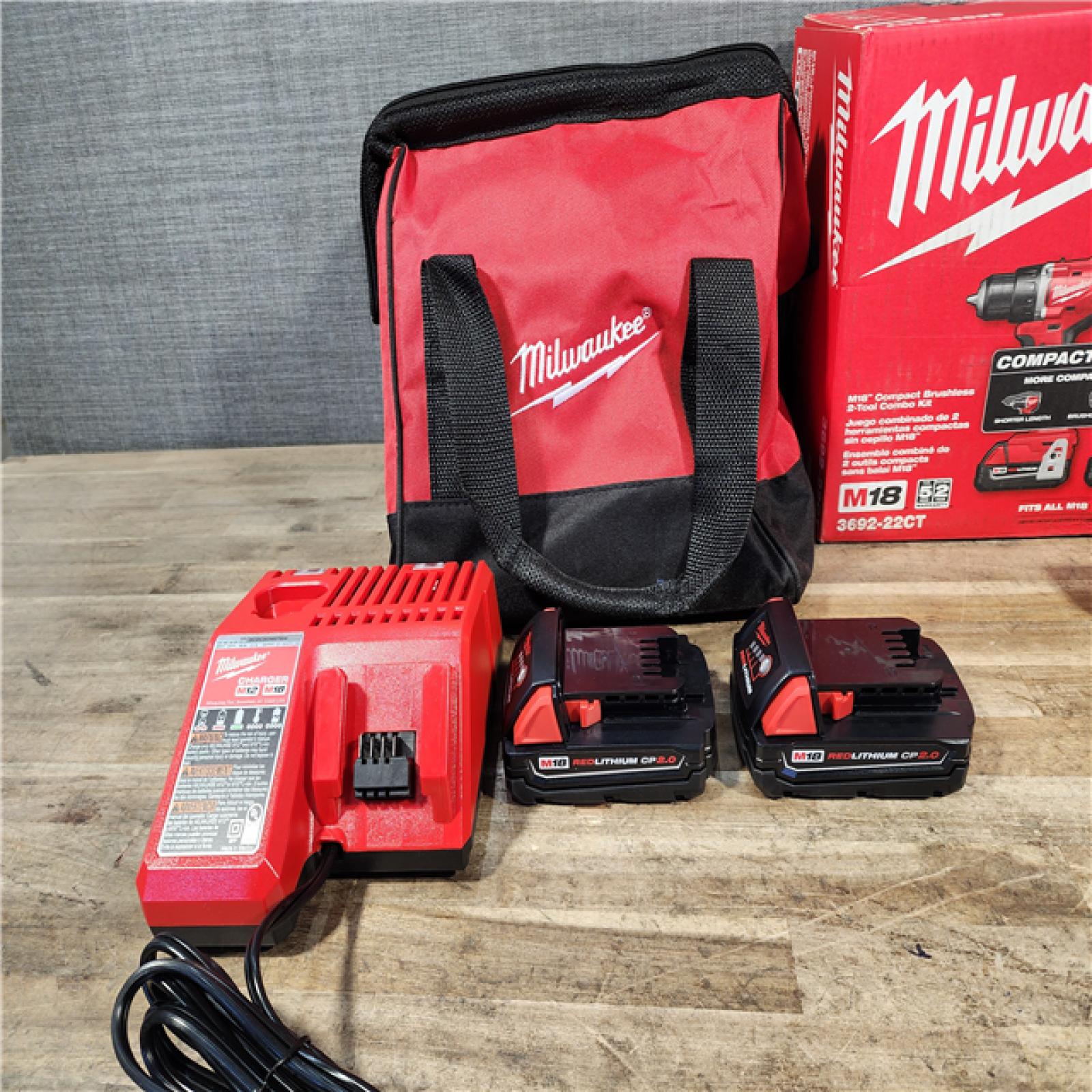 HOUSTON LOCATION - AS-IS Milwaukee M18 18V Lithium-Ion Brushless Cordless Compact Drill/Impact Combo Kit (2-Tool) W/(2) 2.0 Ah Batteries  Charger & Bag