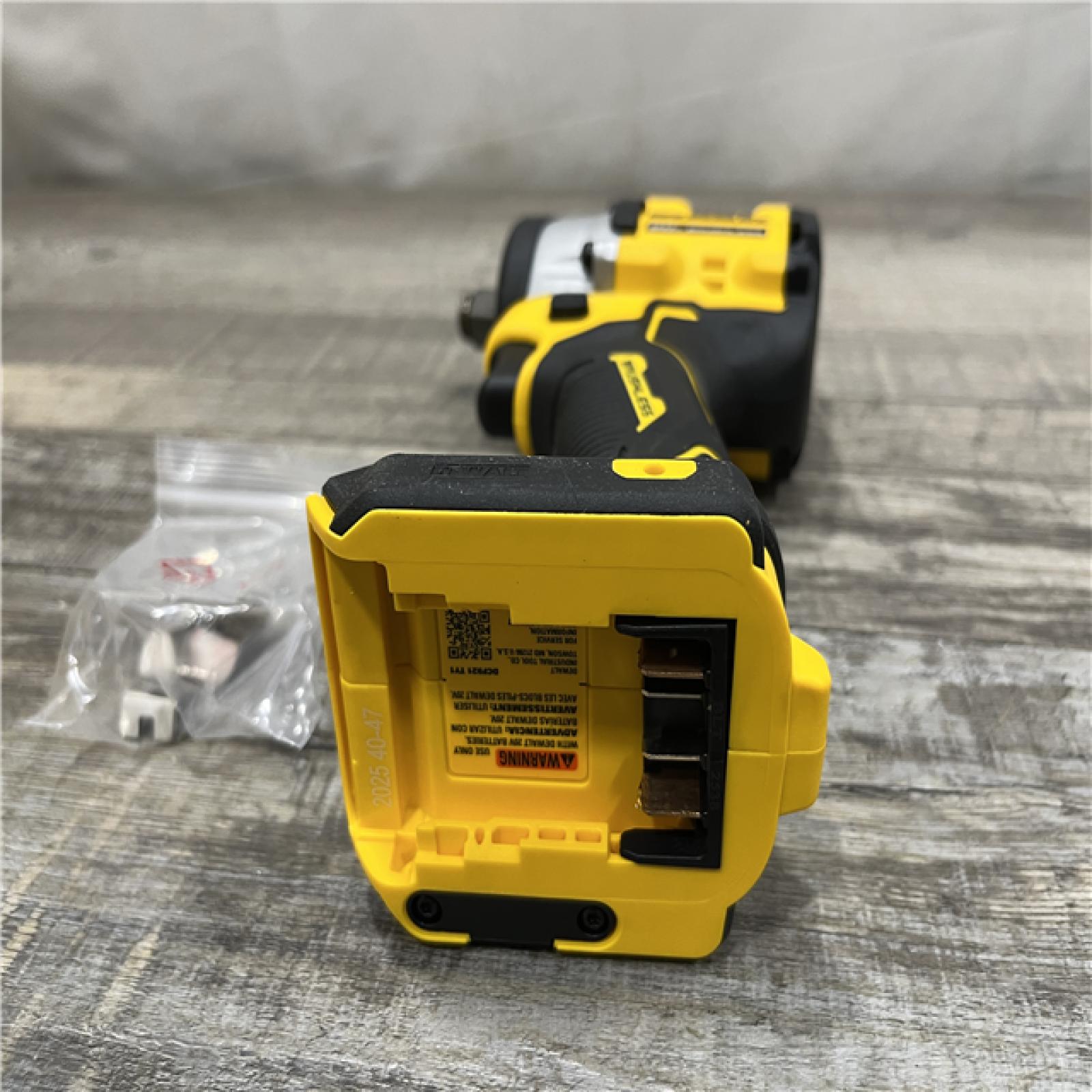 AS-IS DEWALT ATOMIC 20V MAX Cordless Brushless 1/2 in. Variable Speed Impact Wrench (Tool Only)