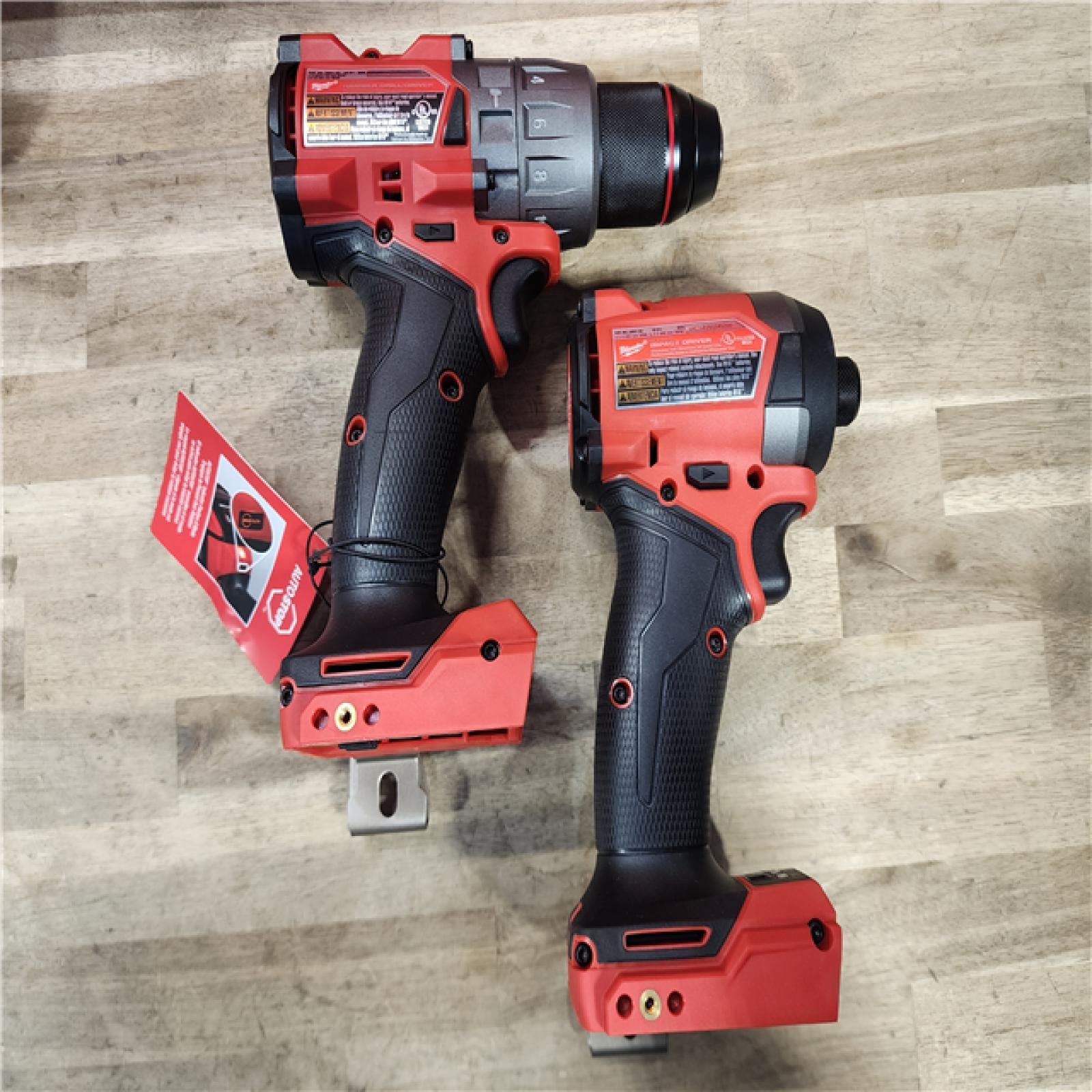 HOUSTON LOCATION - AS-IS (APPEARS LIKE NEW) MILWAUKEE FUEL 18V Lithium-Ion Brushless Cordless Hammer Drill and Impact Driver Combo Kit (2-Tool) with 2 Batteries