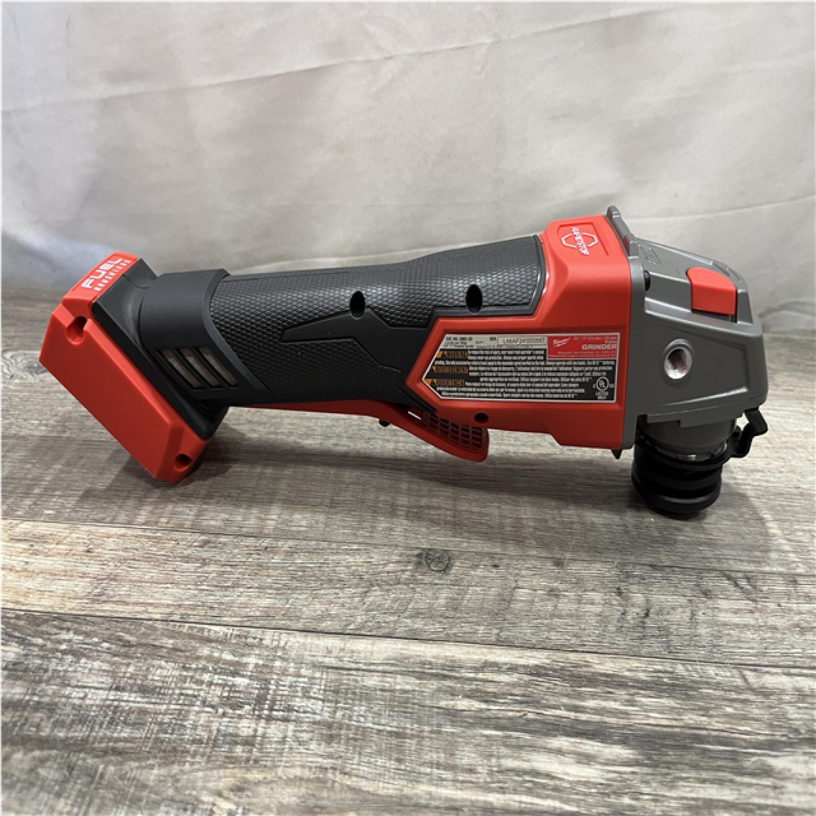 AS-IS Milwaukee FUEL 18V Lithium-Ion Brushless Cordless 4-1/2 in./5 in. Braking Grinder Kit