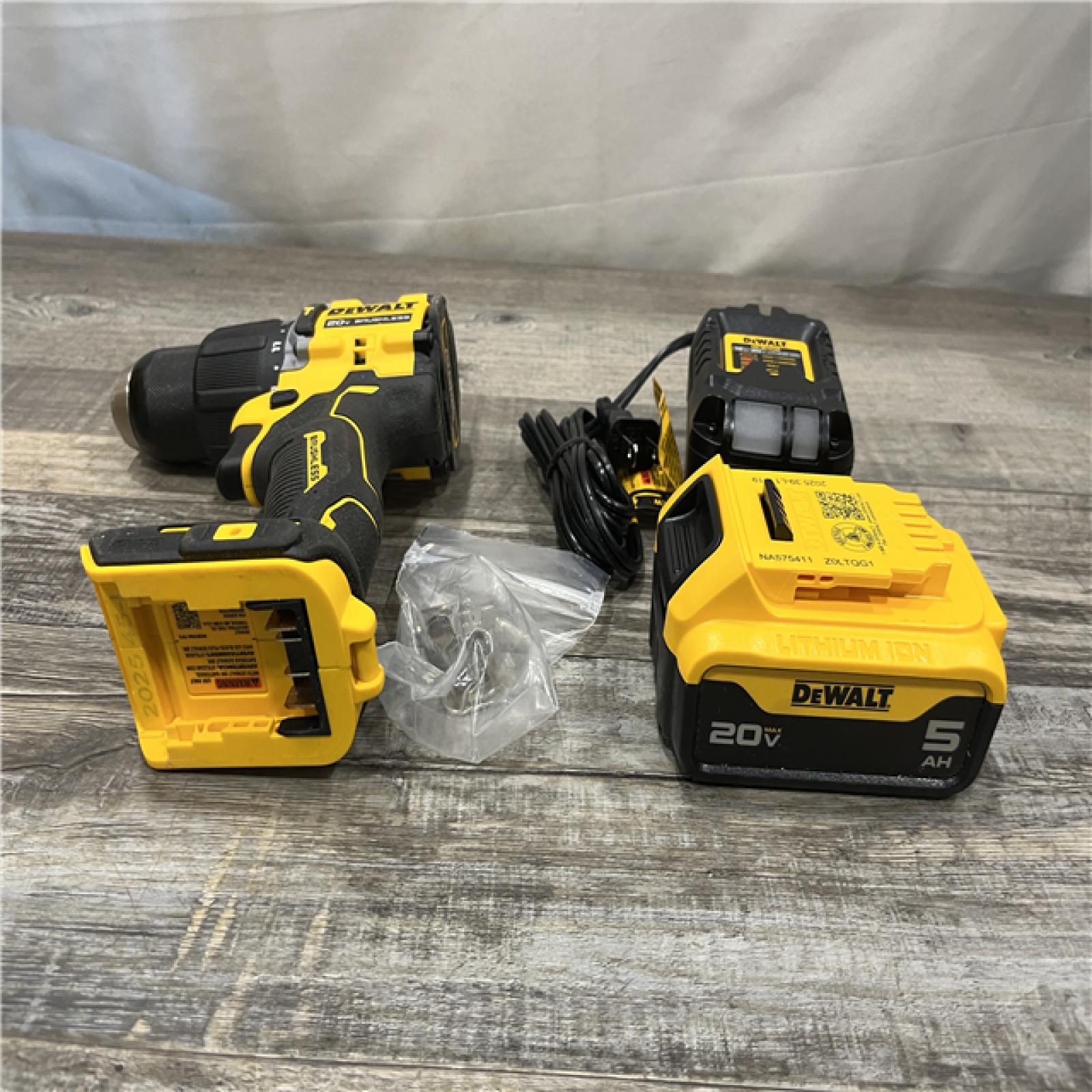 AS-IS DEWALT ATOMIC 20V Lithium-Ion Cordless 1/2 in. Hammer Drill Kit