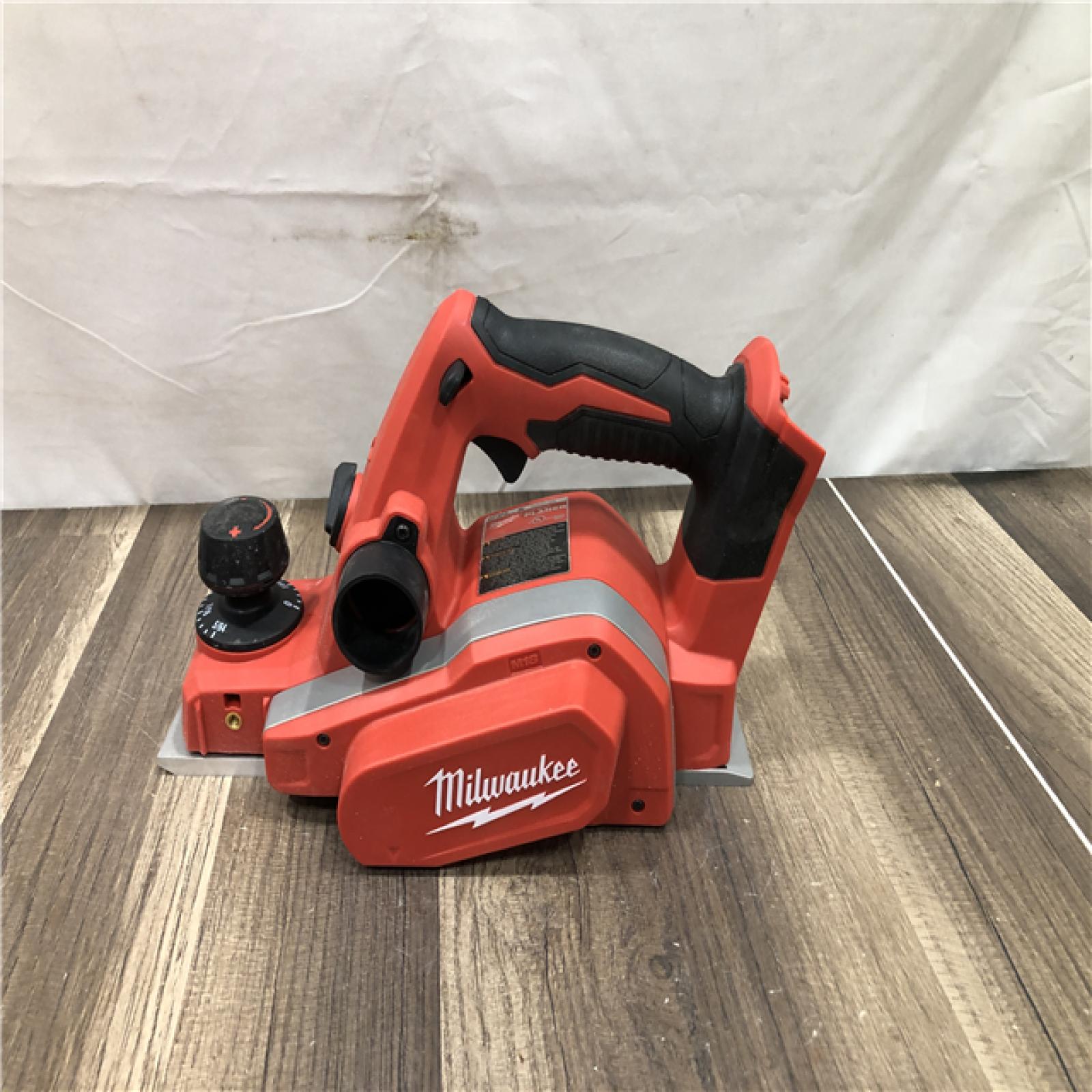 AS-IS Milwaukee M18 18V Lithium-Ion Cordless 3-1/4 in. Planer (Tool-Only)