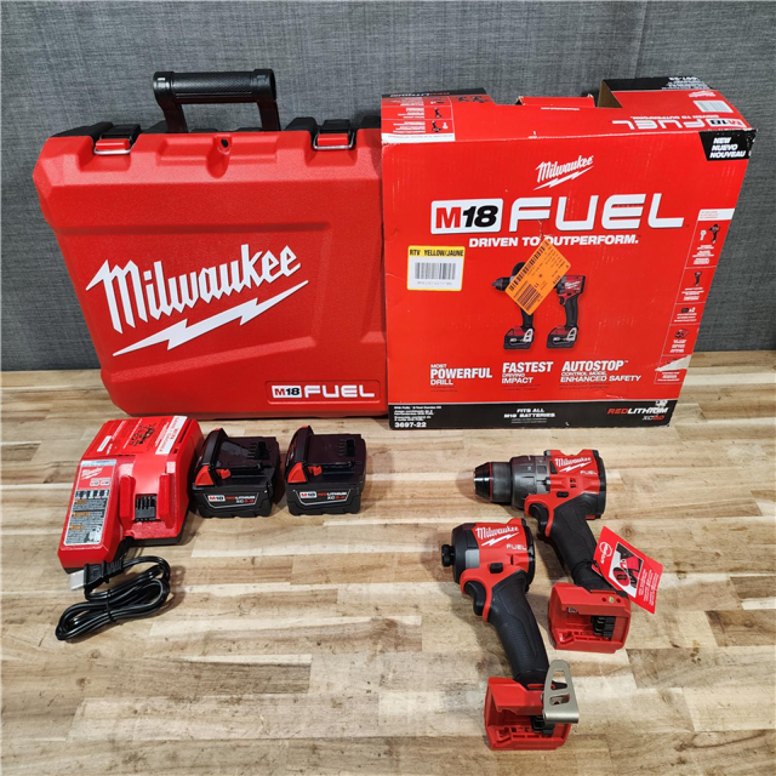 HOUSTON LOCATION - AS-IS Milwaukee FUEL 18V Lithium-Ion Brushless Cordless Hammer Drill and Impact Driver Combo Kit