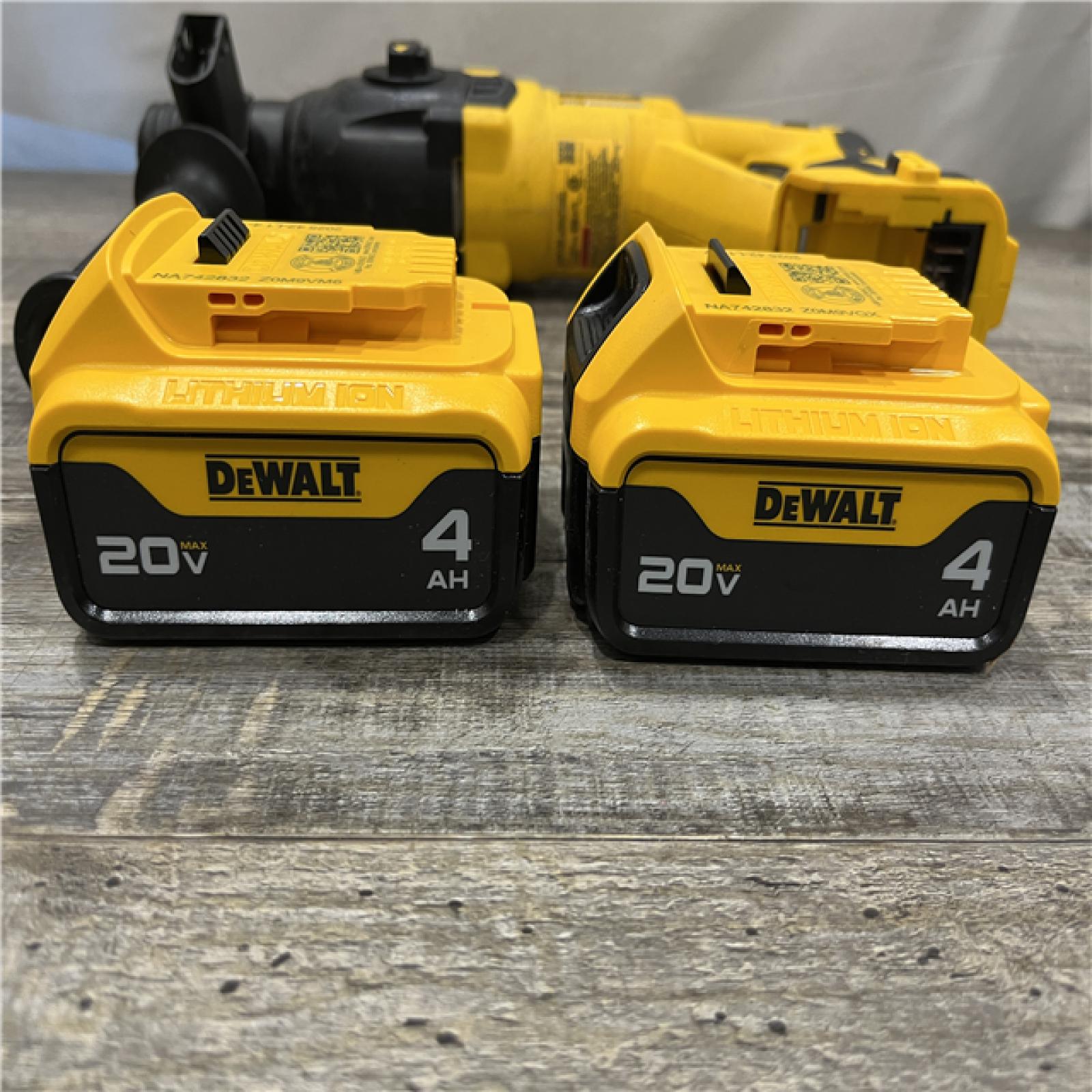 AS-IS DEWALT 20V MAX Cordless Brushless 1 in. SDS Plus D-Handle Concrete and Masonry Rotary Hammer Kit