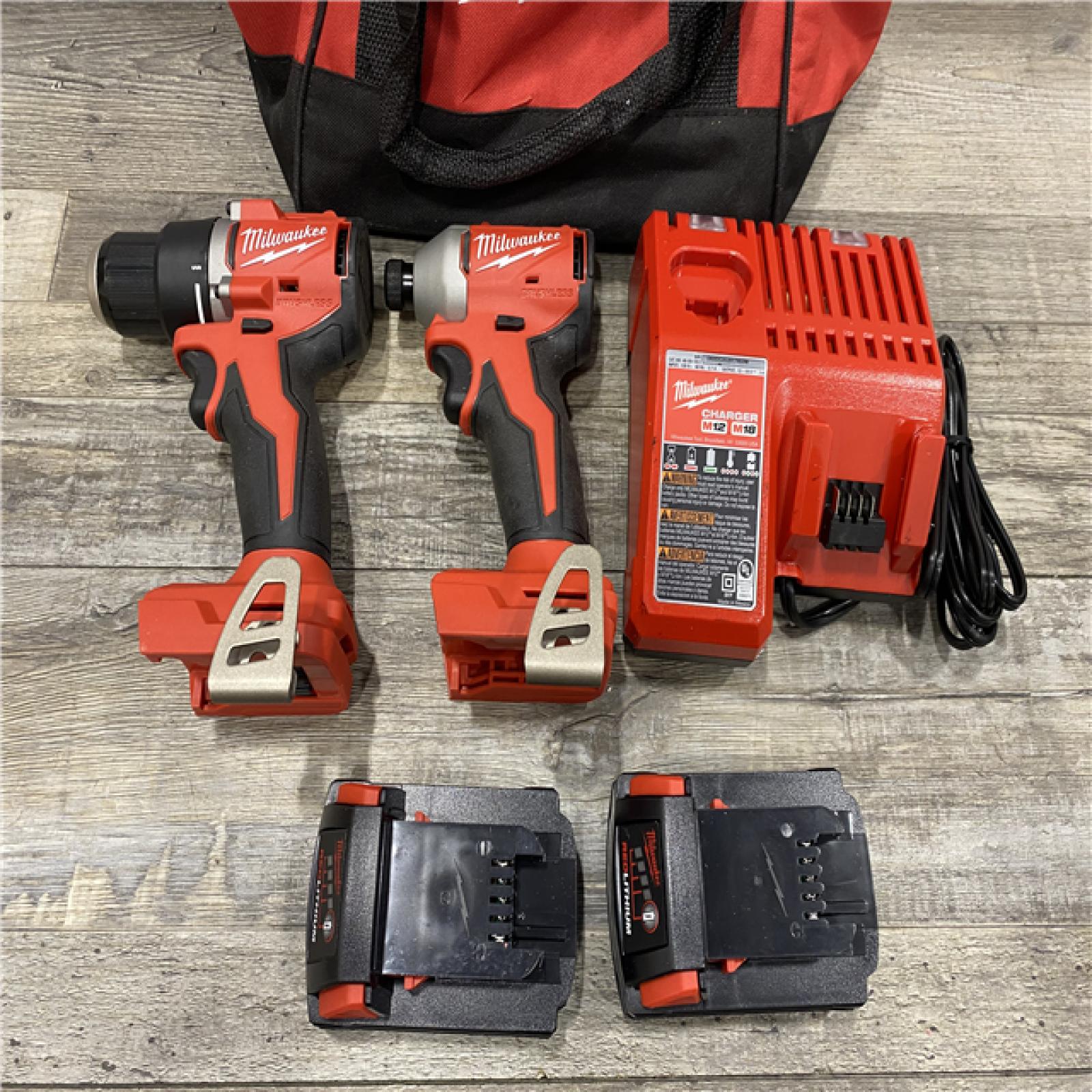 AS-IS Milwaukee 18V Lithium-Ion Brushless Cordless Compact Drill/Impact Combo Kit
