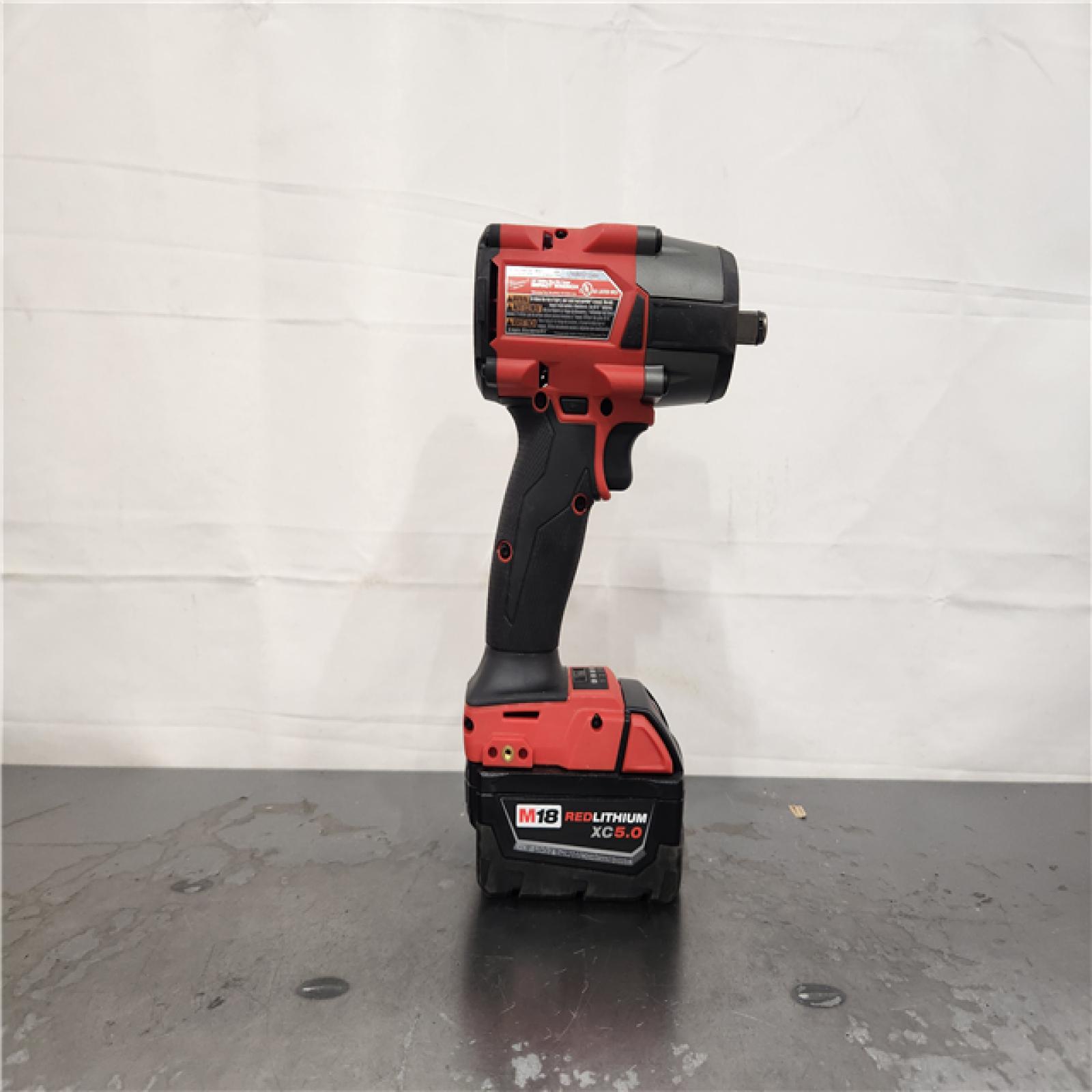 AS-IS- Milwaukee M18 FUEL 1/2 in. Cordless Brushless Mid-Torque Impact Wrench Kit (Battery & Charger)