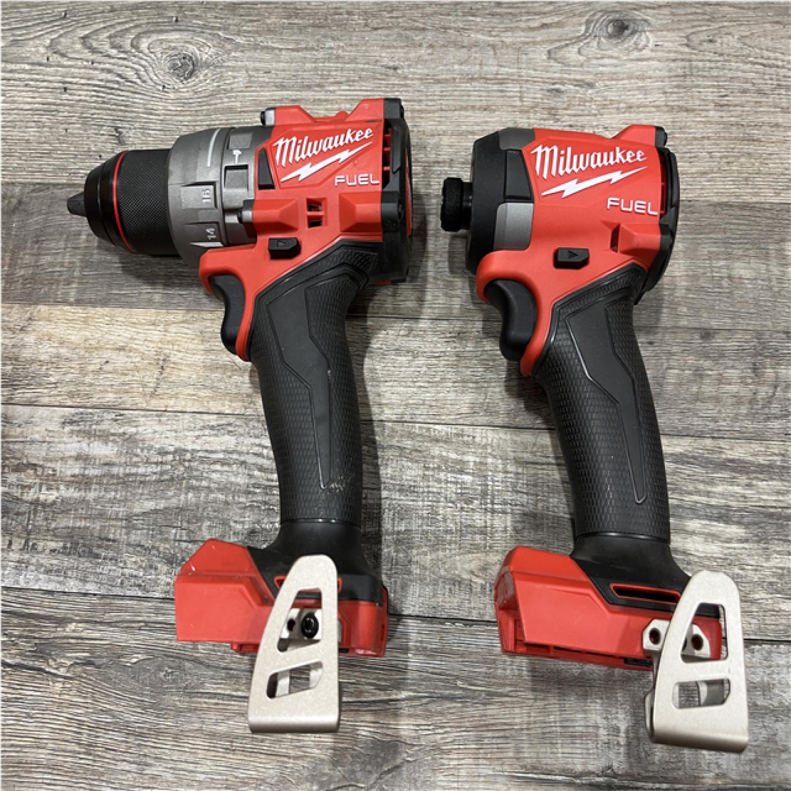 AS-IS Milwaukee FUEL 18V Lithium-Ion Brushless Cordless Hammer Drill and Impact Driver Combo Kit