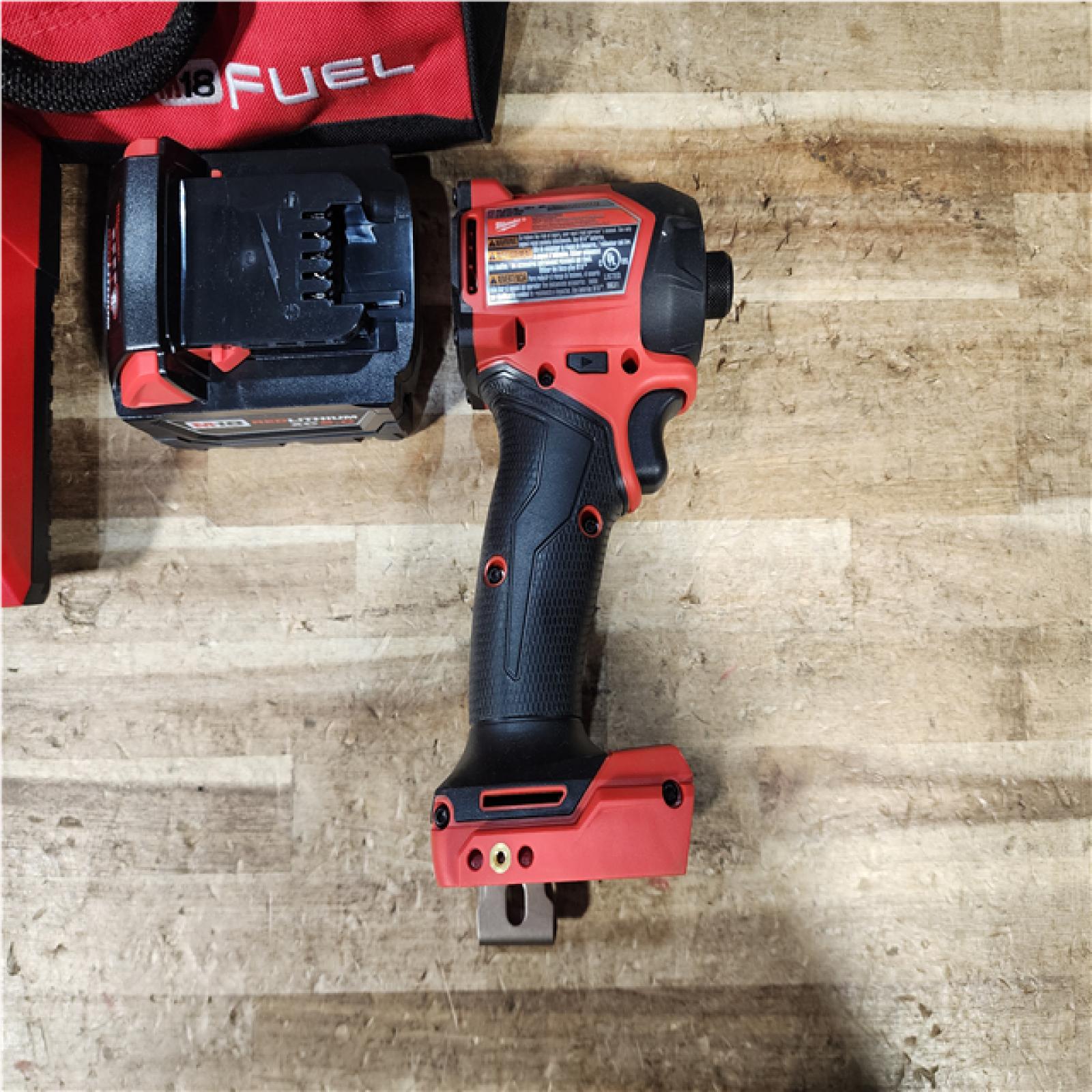 HOUSTON LOCATION - AS - IS Milwaukee  FUEL SURGE 18V Lithium-Ion Brushless Cordless 1/4 in. Hex Impact Driver with (1) 5.0 Ah Battery and Charger