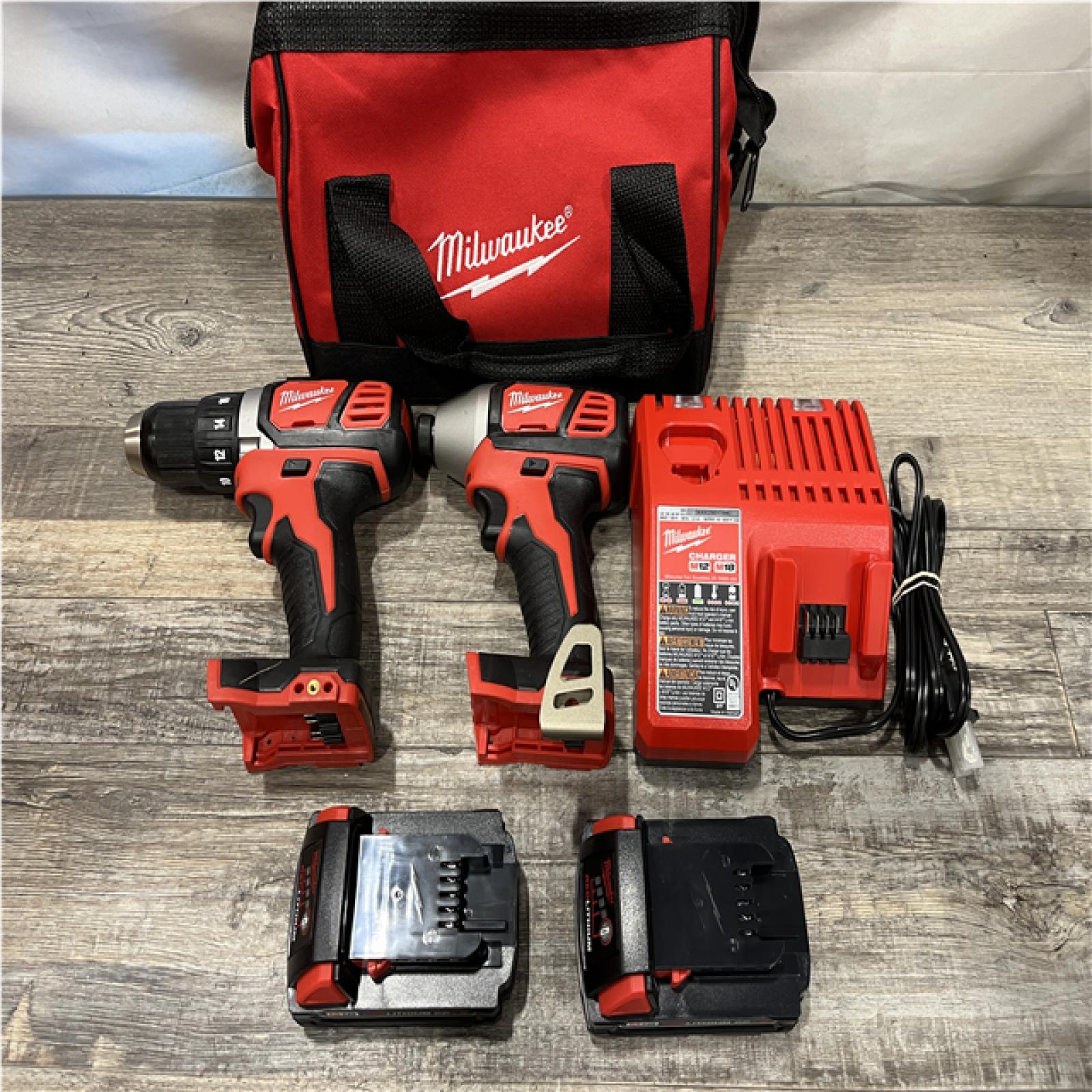 AS-IS Milwaukee 18V Lithium-Ion Cordless Drill Driver/Impact Driver Combo Kit