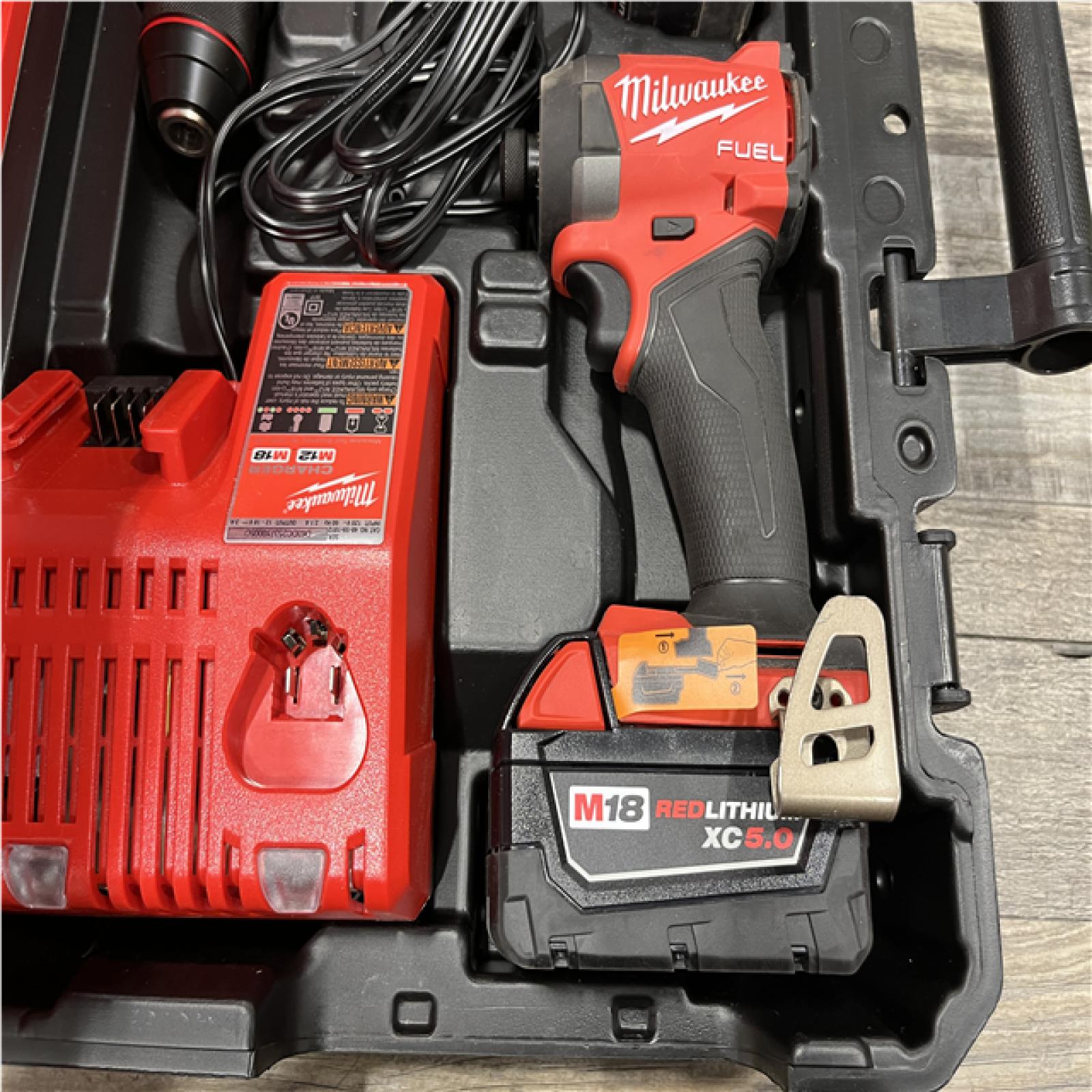 AS-IS Milwaukee FUEL 18V Lithium-Ion Brushless Cordless Hammer Drill and Impact Driver Combo Kit