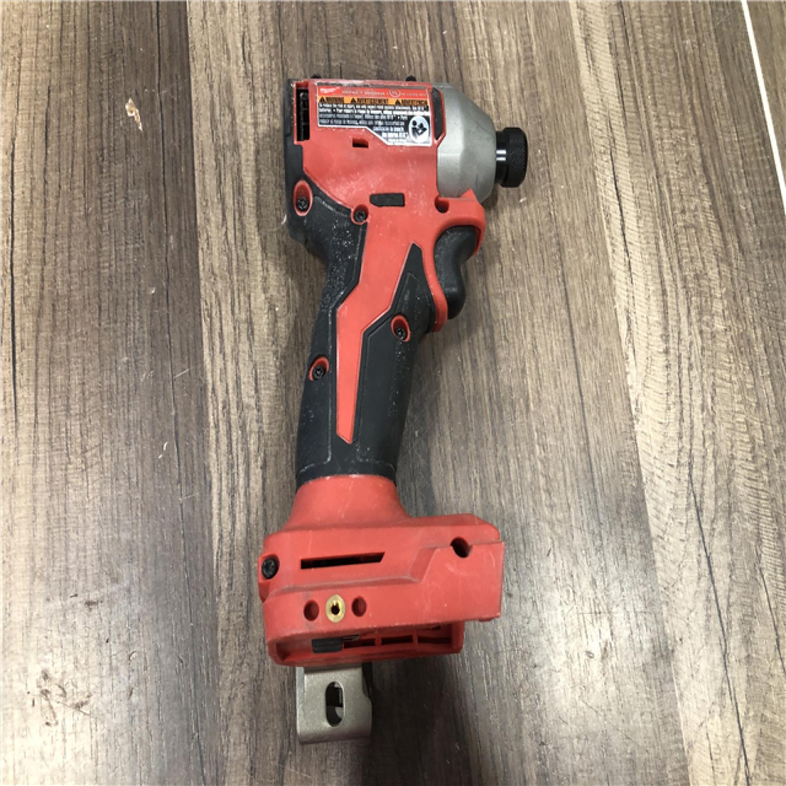 AS-IS Milwaukee 18V Lithium-Ion Brushless Cordless 1/4 in. Compact Impact Driver (Tool Only)