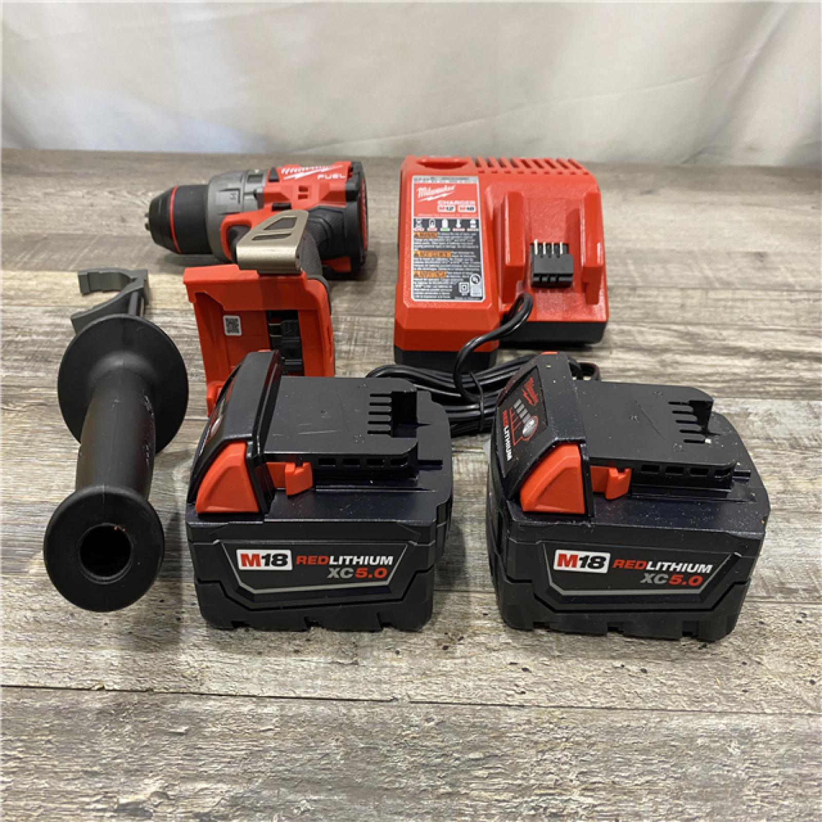 AS-IS Milwaukee FUEL 18V Lithium-Ion Brushless Cordless 1/2 in. Hammer Drill Driver Kit