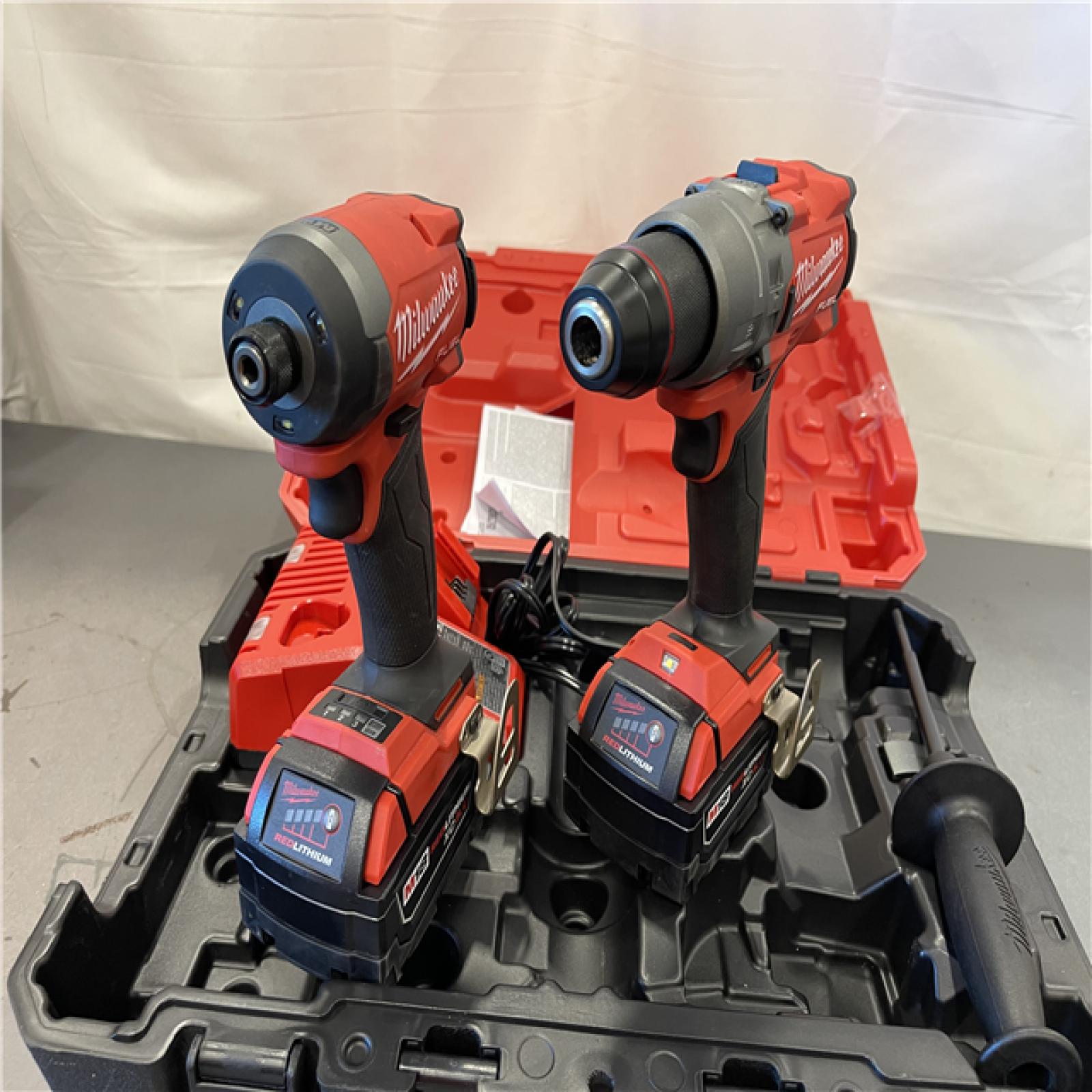 AS-IS - MILWAUKEE FUEL 18V Lithium-Ion Brushless Cordless Hammer Drill and Impact Driver Combo Kit (2 Tool)