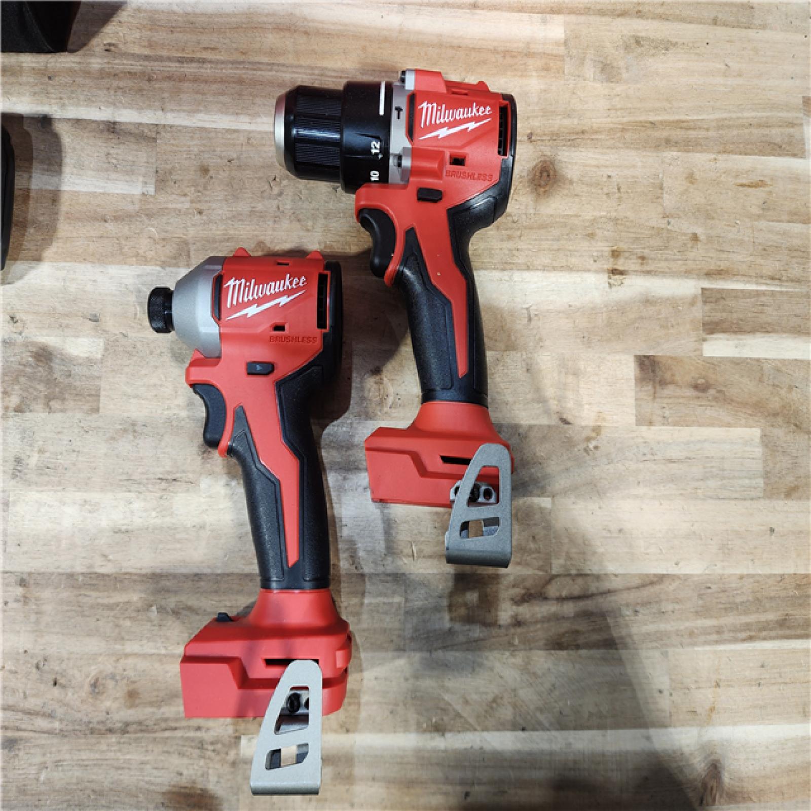 HOUSTON LOCATION - AS-IS (APPEARS LIKE NEW) M18 18-Volt Lithium-Ion Brushless Cordless Compact Hammer Drill/Impact Combo Kit (2-Tool) with (2) Batteries  Bag