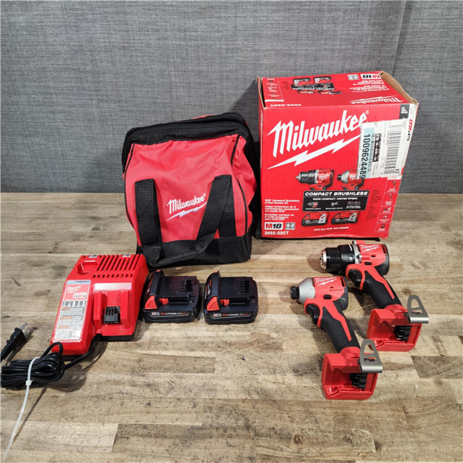 HOUSTON LOCATION - AS-IS Milwaukee M18 18V Lithium-Ion Brushless Cordless Compact Drill/Impact Combo Kit (2-Tool) W/(2) 2.0 Ah Batteries  Charger & Bag