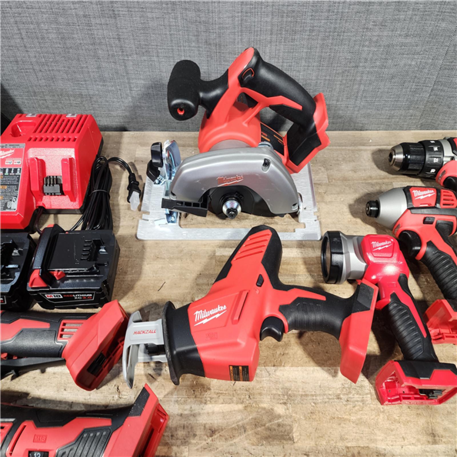 HOUSTON LOCATION - AS-IS (APPEARS LIKE NEW) M18 18-Volt Lithium-Ion Cordless Combo Kit 7-Tool with 2-Batteries  Charger and Tool Bag