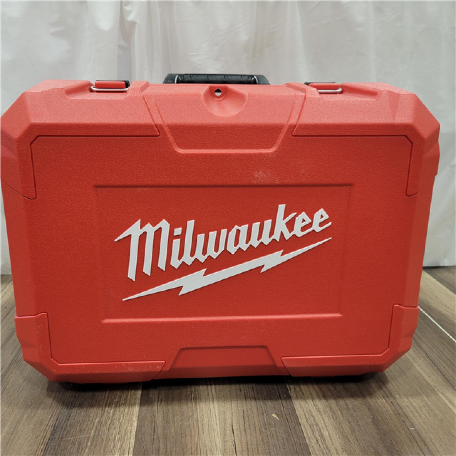 LIKE NEW! Milwaukee M18 2000 Ft. Red Exterior Rotary Laser Level Kit with Receiver, Receiver Clamp, Tripod, and Grade Rod