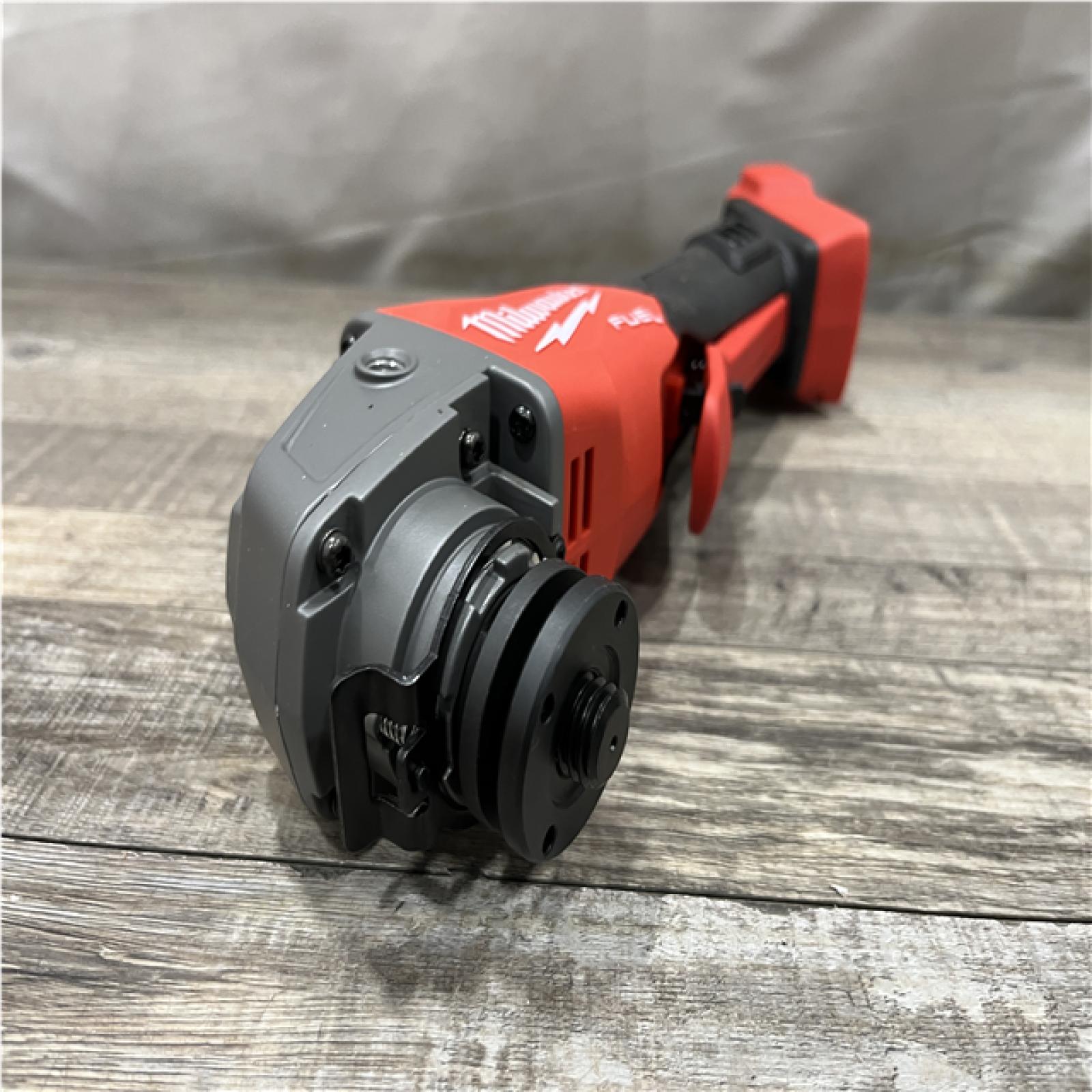 AS-IS Milwaukee FUEL 18V Lithium-Ion Brushless Cordless 4-1/2 in./5 in. Grinder with Variable Speed & Paddle Switch (Tool-Only)