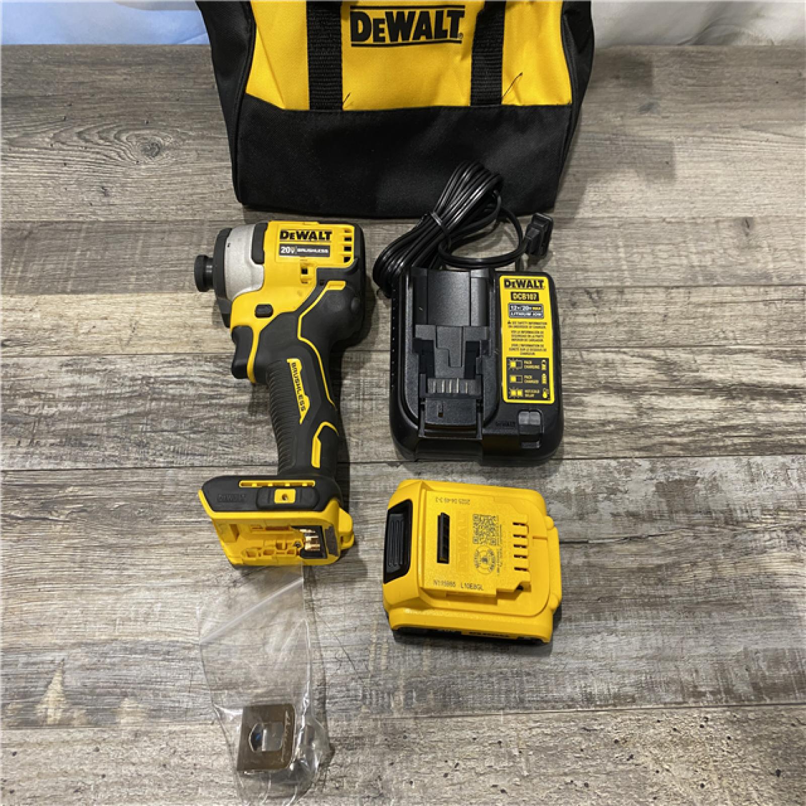 AS-IS DEWALT Atomic 20V Max Lithium-Ion Brushless Cordless Compact 1/4 in. Impact Driver Kit